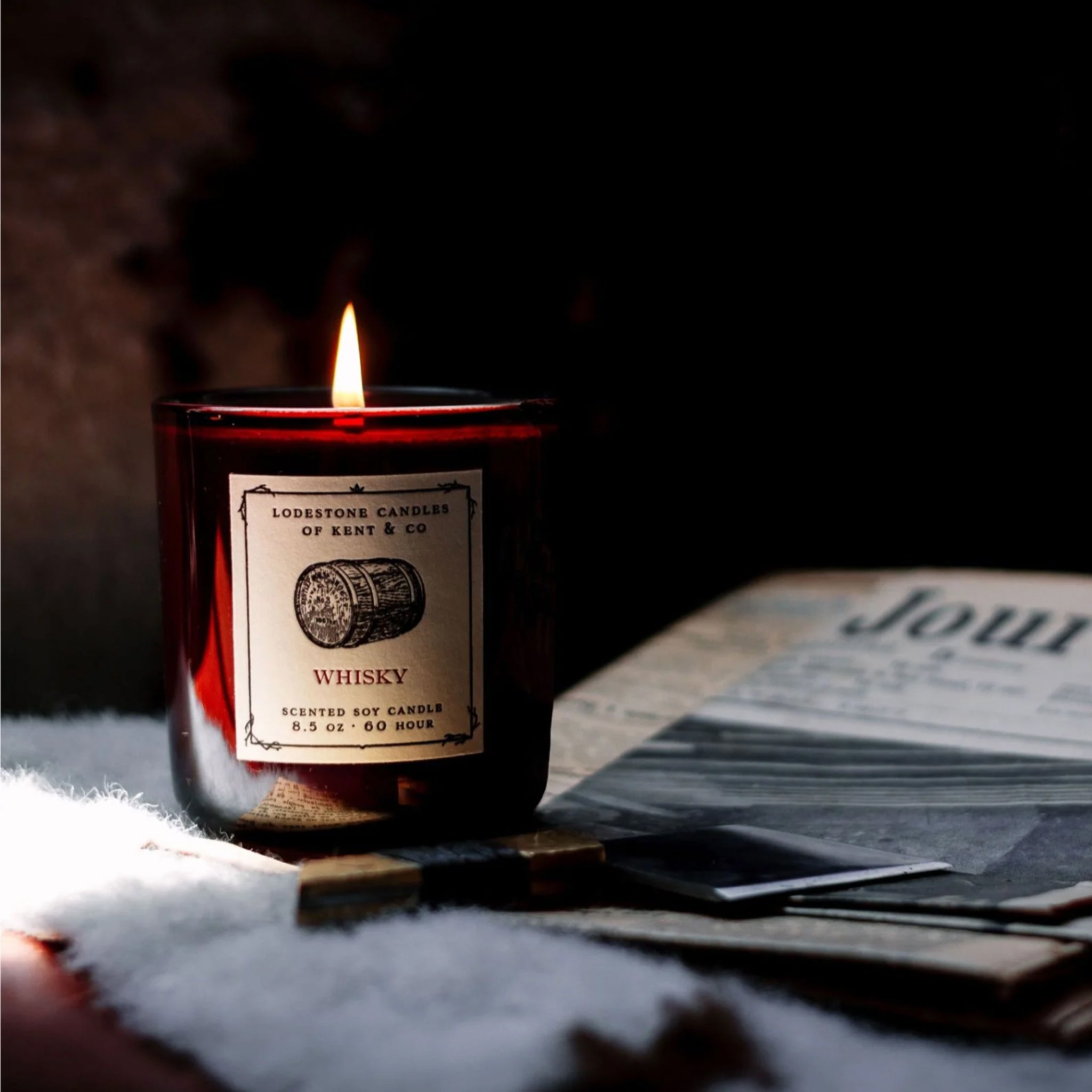 Lodestone Whiskey Candle on a black background at Addison West