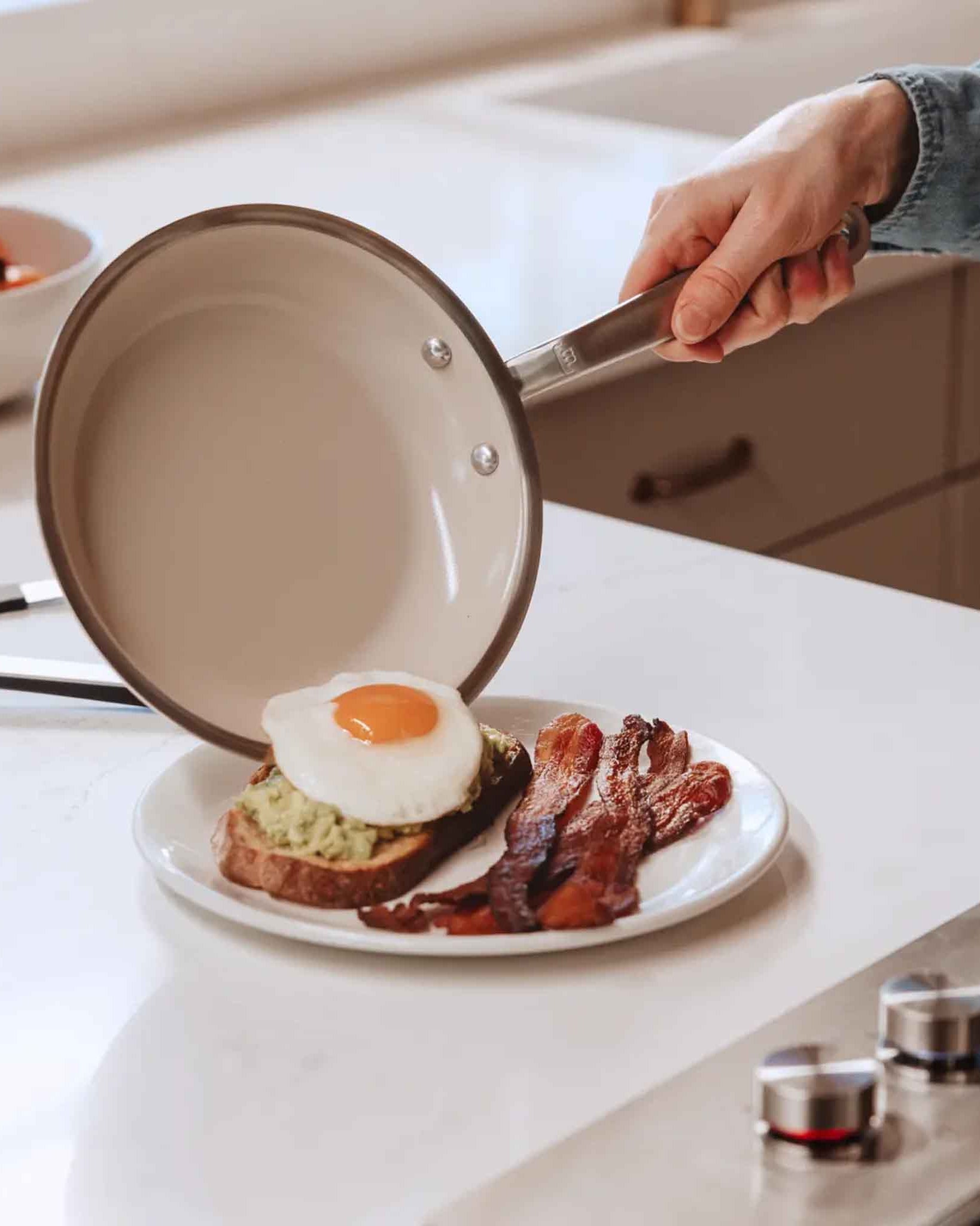 Made In CeramiClad™ 12” Non-stick Fry Pan on a counter with food at Addison West