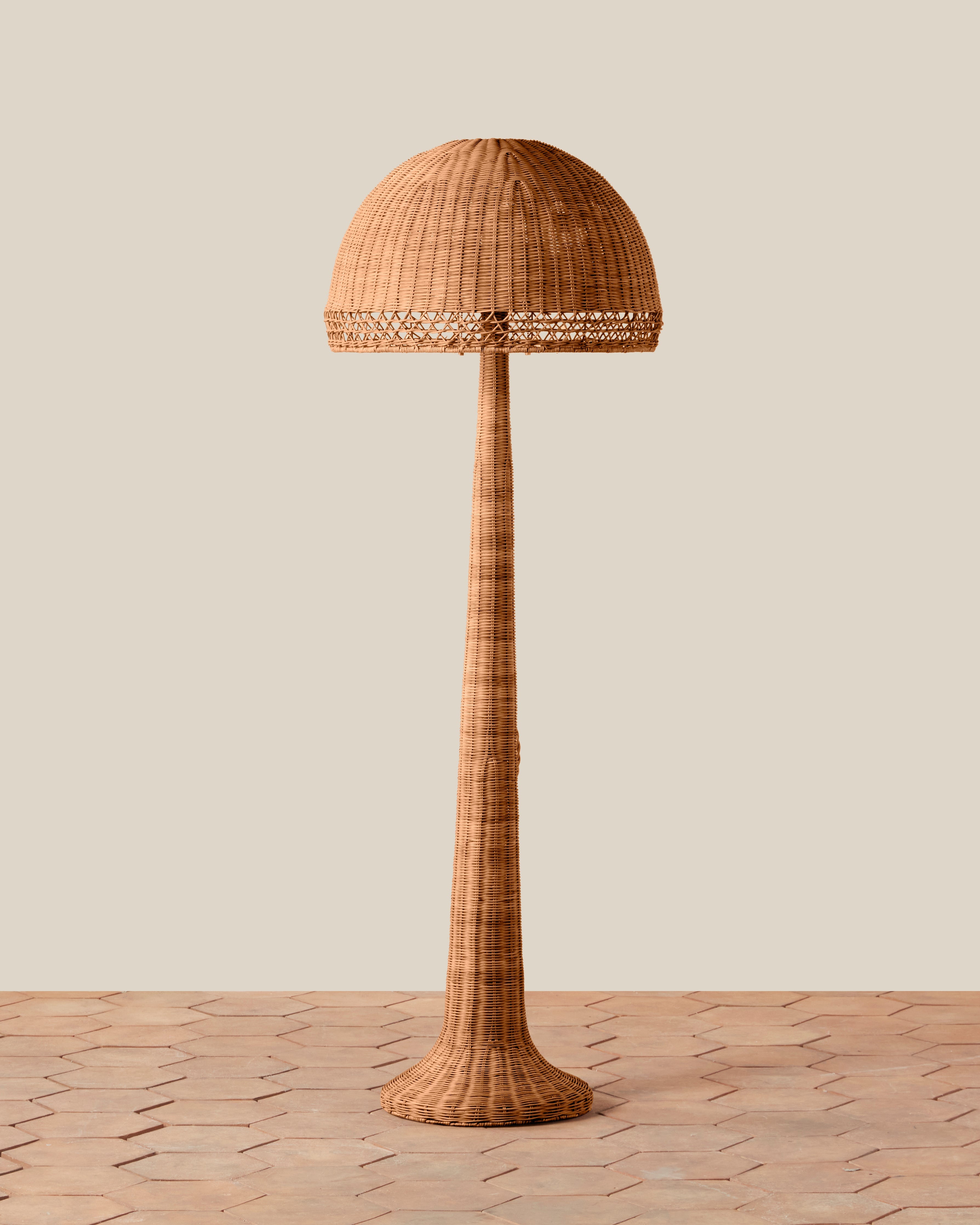Woven Augusta Floor Lamp on a beige background at Addison West