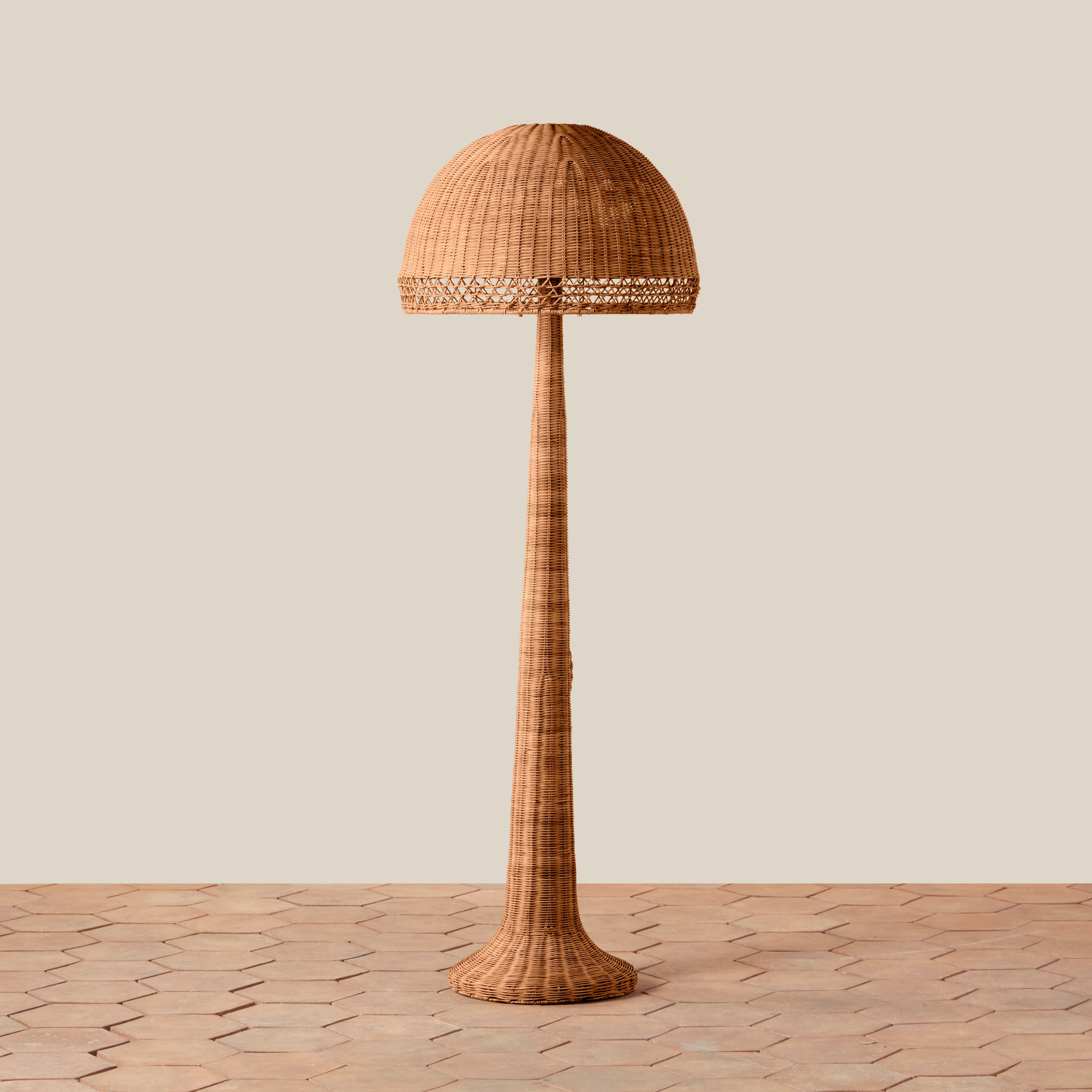 Woven Augusta Floor Lamp on a beige background at Addison West