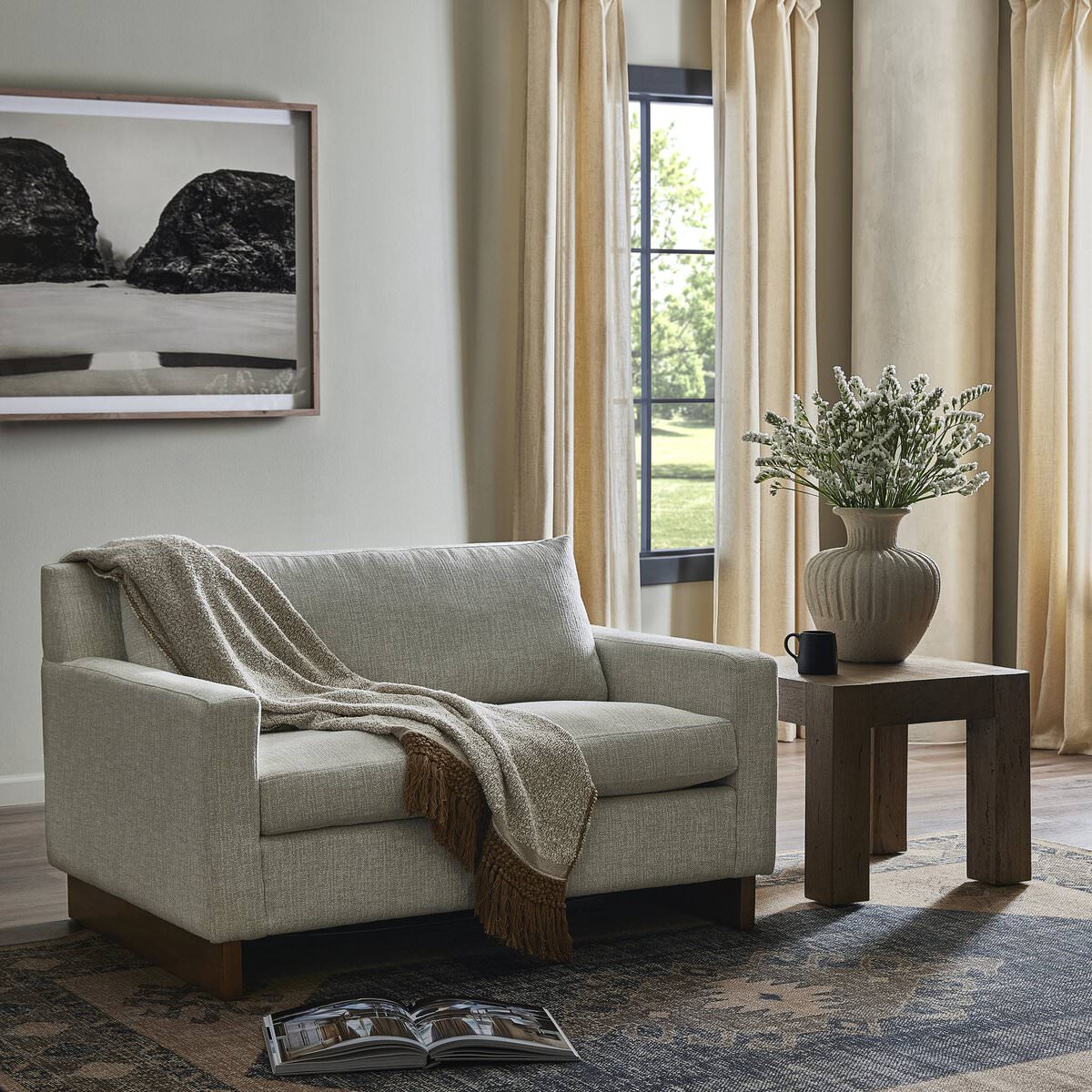 Marquez Sleeper Chair in Alameda Snow in a modern living room