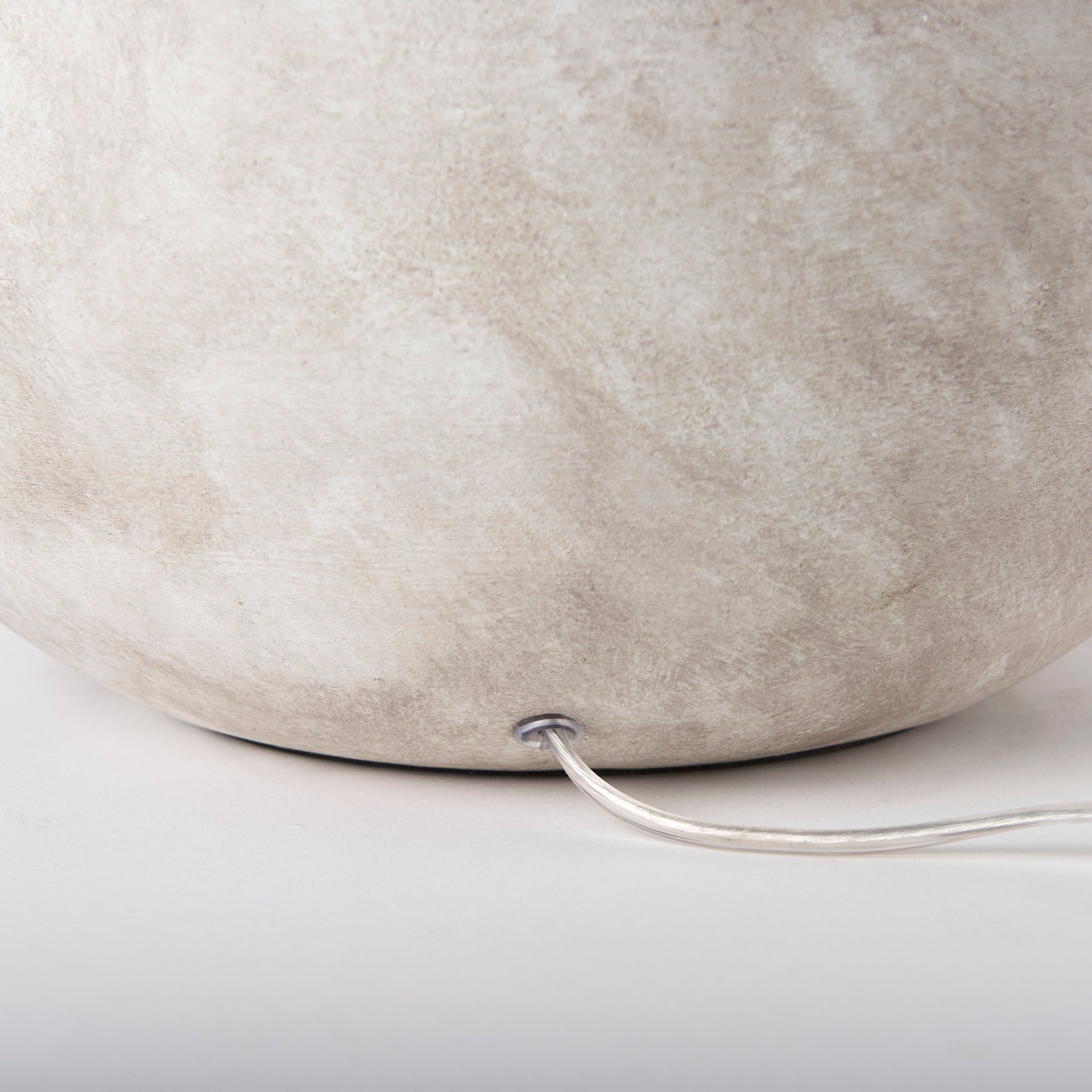 Close up of Mehdi Cream Ceramic Table Lamp on a white background