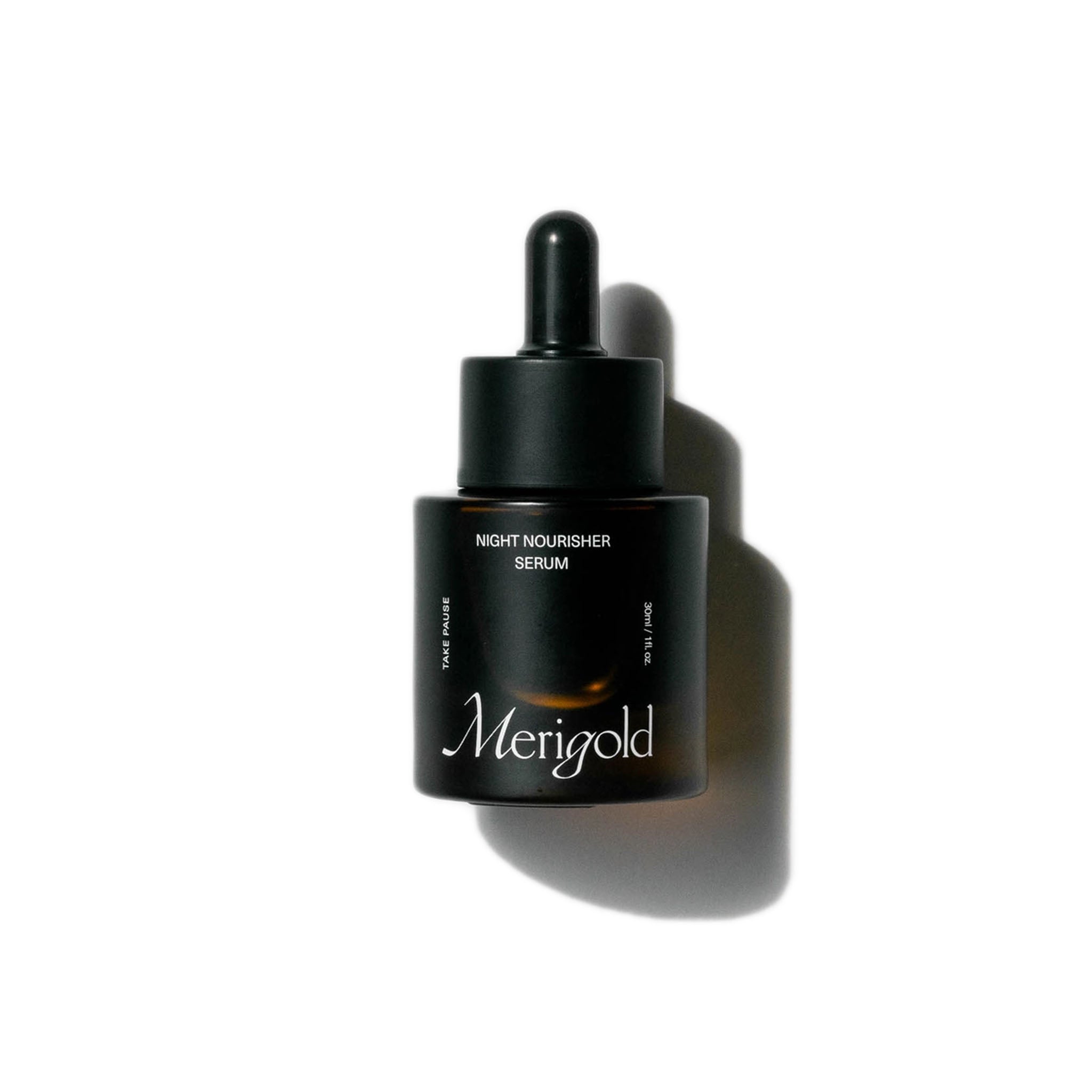 Merigold Night Nourisher Serum bottle on a white background