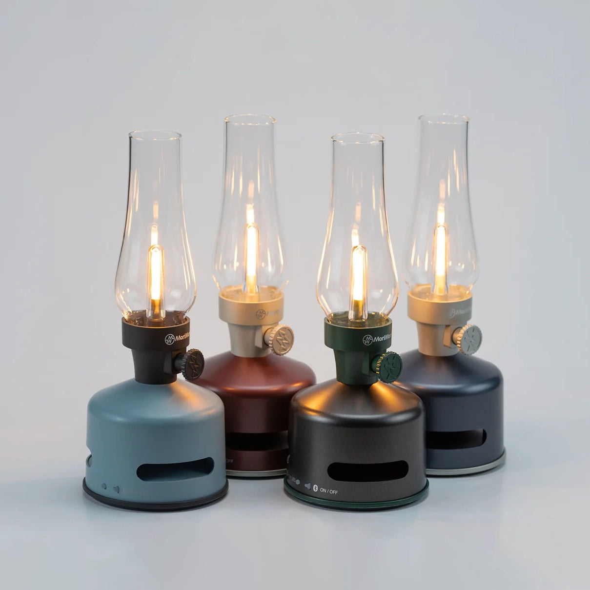 Light and Sound LED Lantern with Speaker in Sky Blue with other Mori Mori lanterns on a white background at Addison West