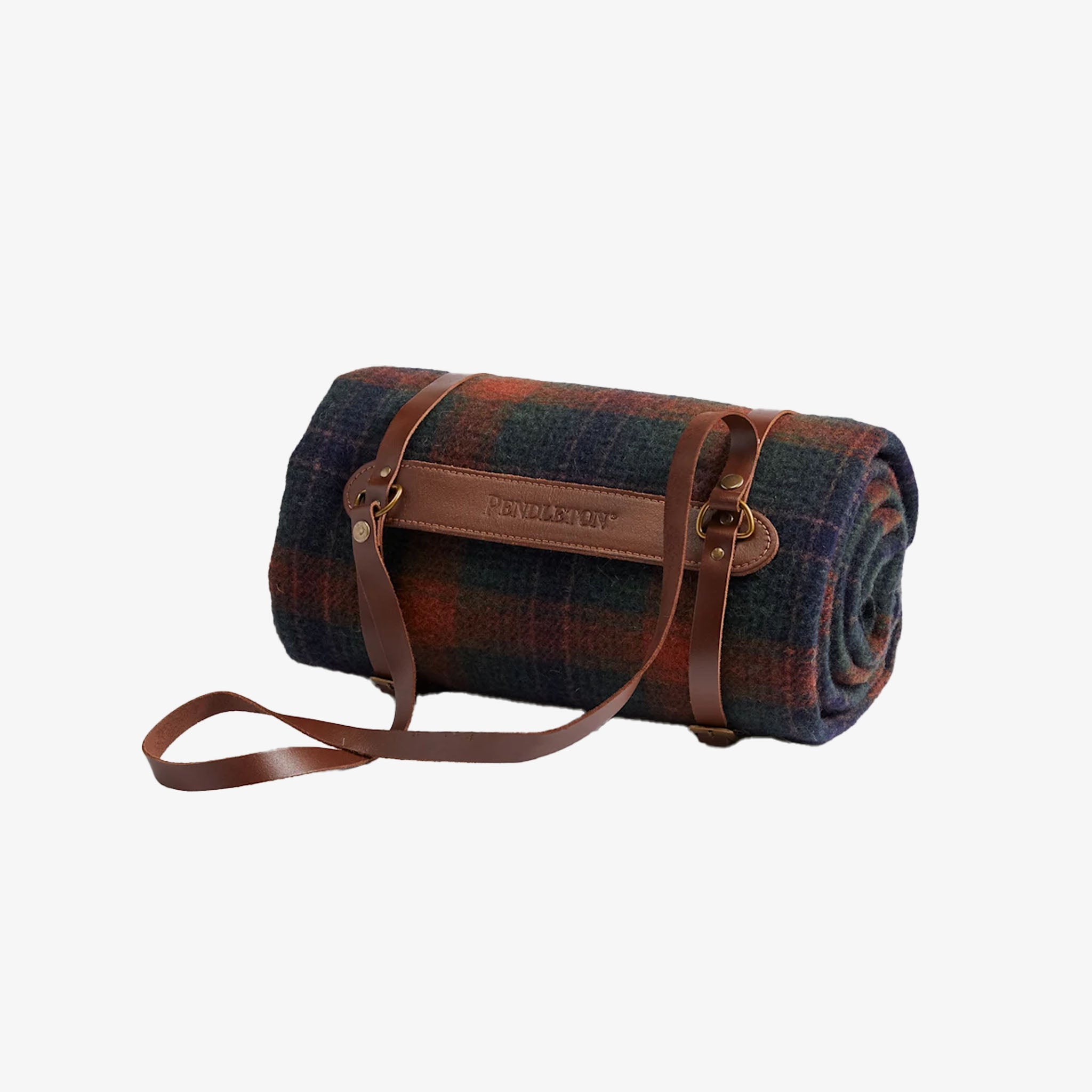Roll-up plaid blanket with leather strap on a white background