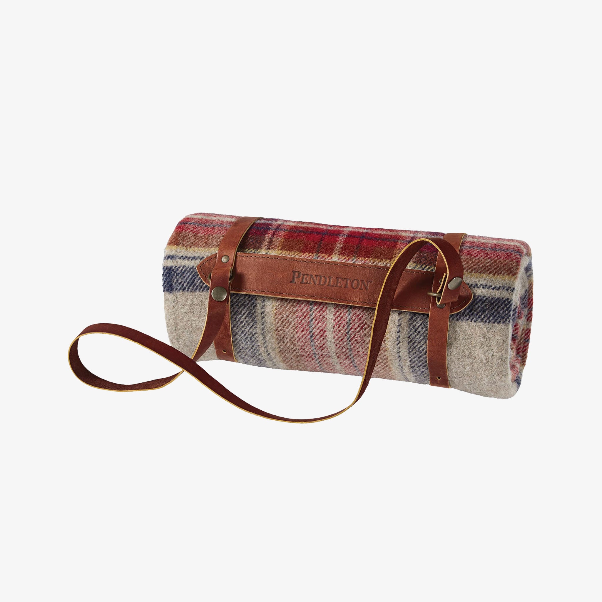 Plaid picnic blanket with leather straps on a white background