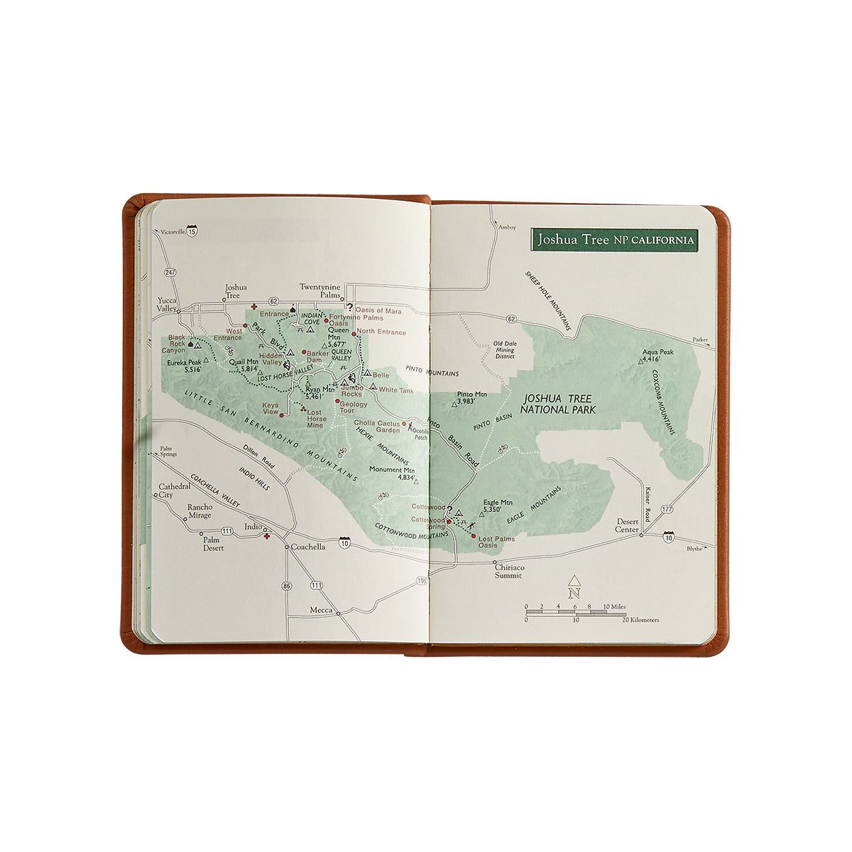 National Parks Green Leather Pocket Atlas on white background at Addison West.