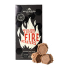 Wildwood natural wood and beeswax fire starters with black and white packaging on a white background