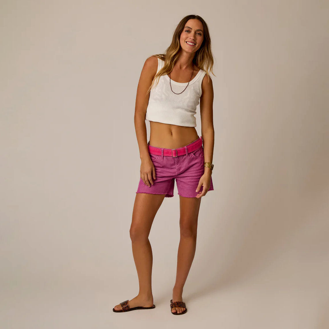 Oahu 4“ Short in Rouge shown on model on plain background.