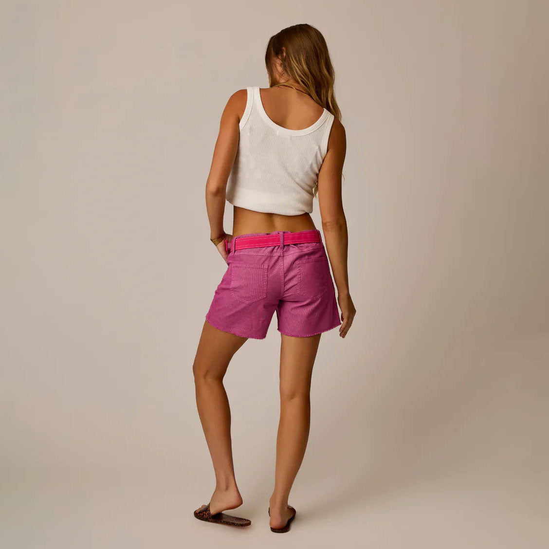 Oahu 4“ Short in Rouge shown on model on plain background.