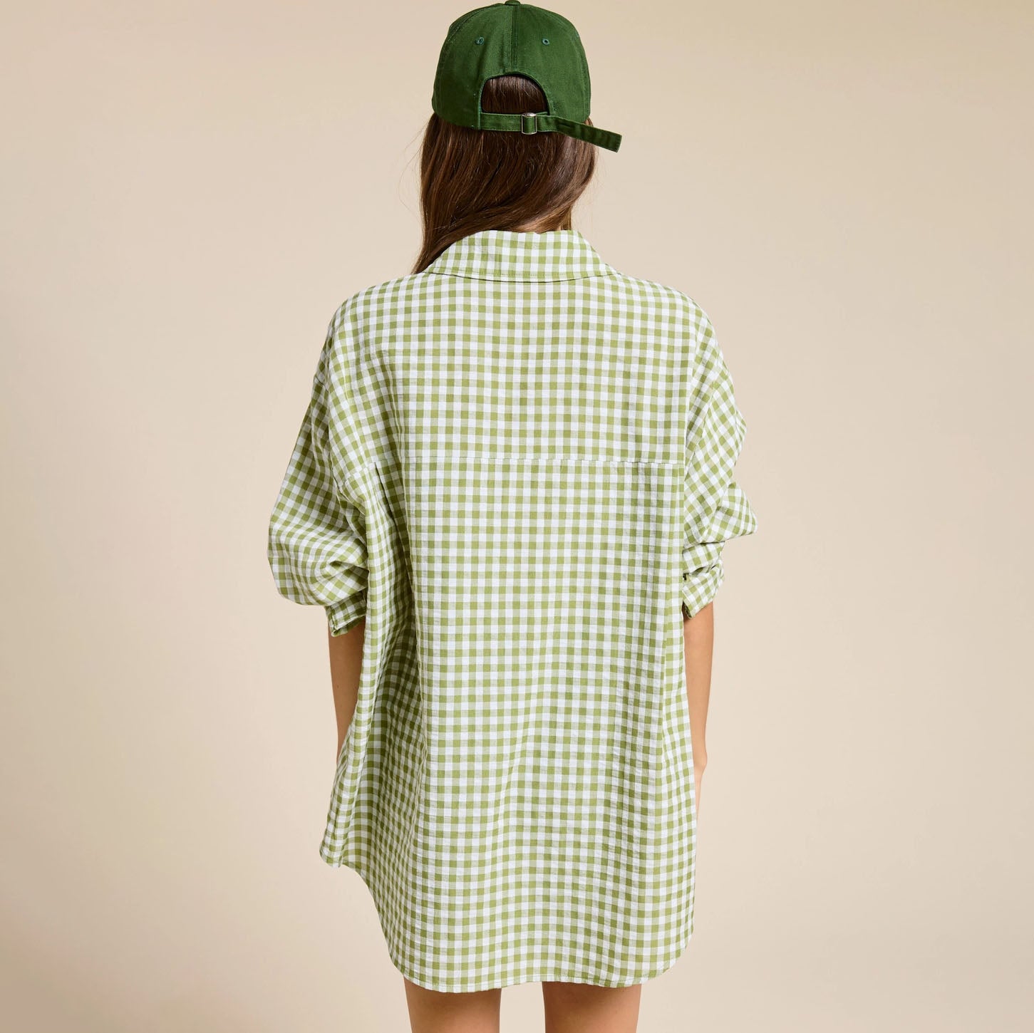Oversized Gingham Buttom Down in Leaf shown on model on plain background.