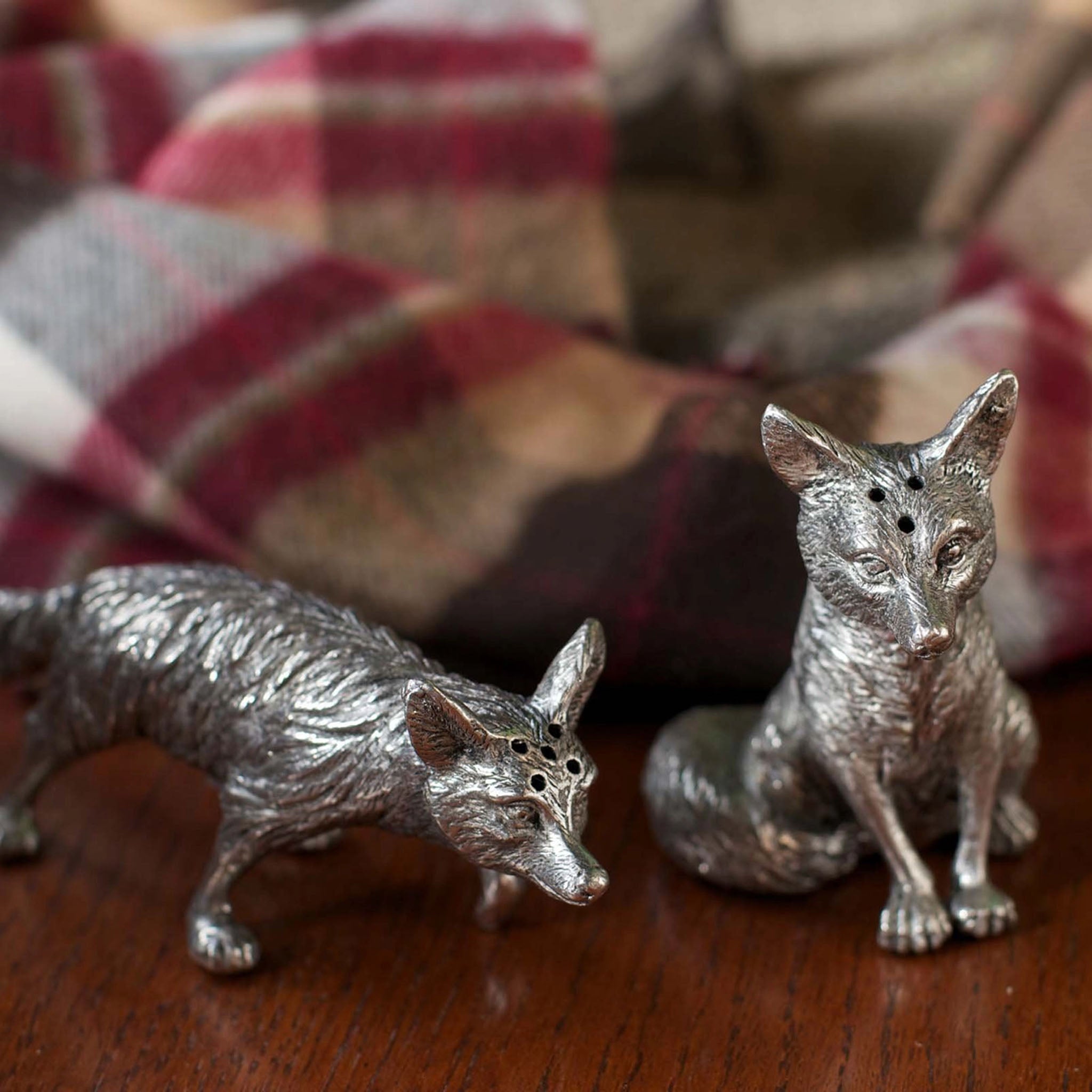 Pewter Foxes Salt & Pepper Set on a wood table at Addison West