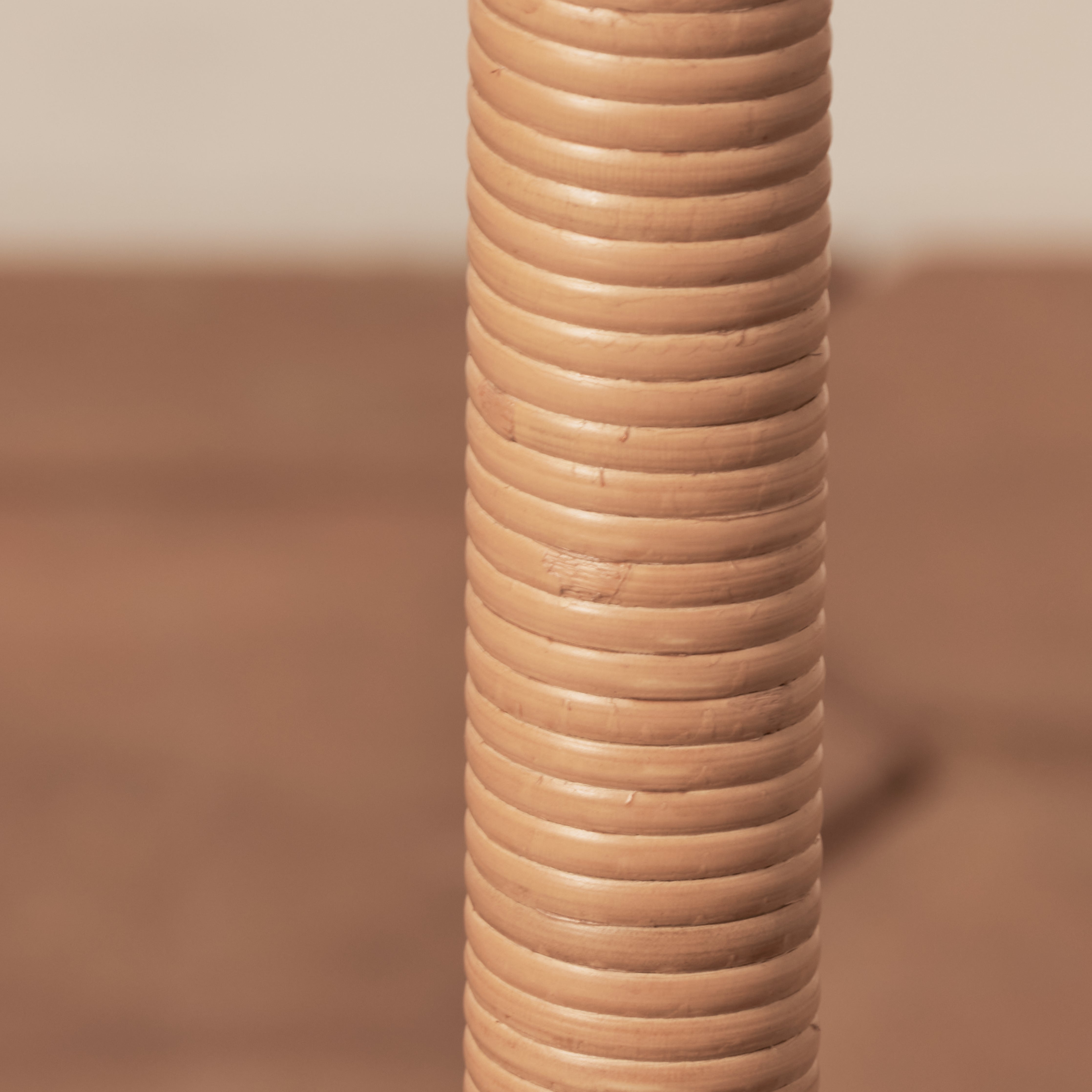 Close up of Delphine Floor Lamp on a beige background at Addison West