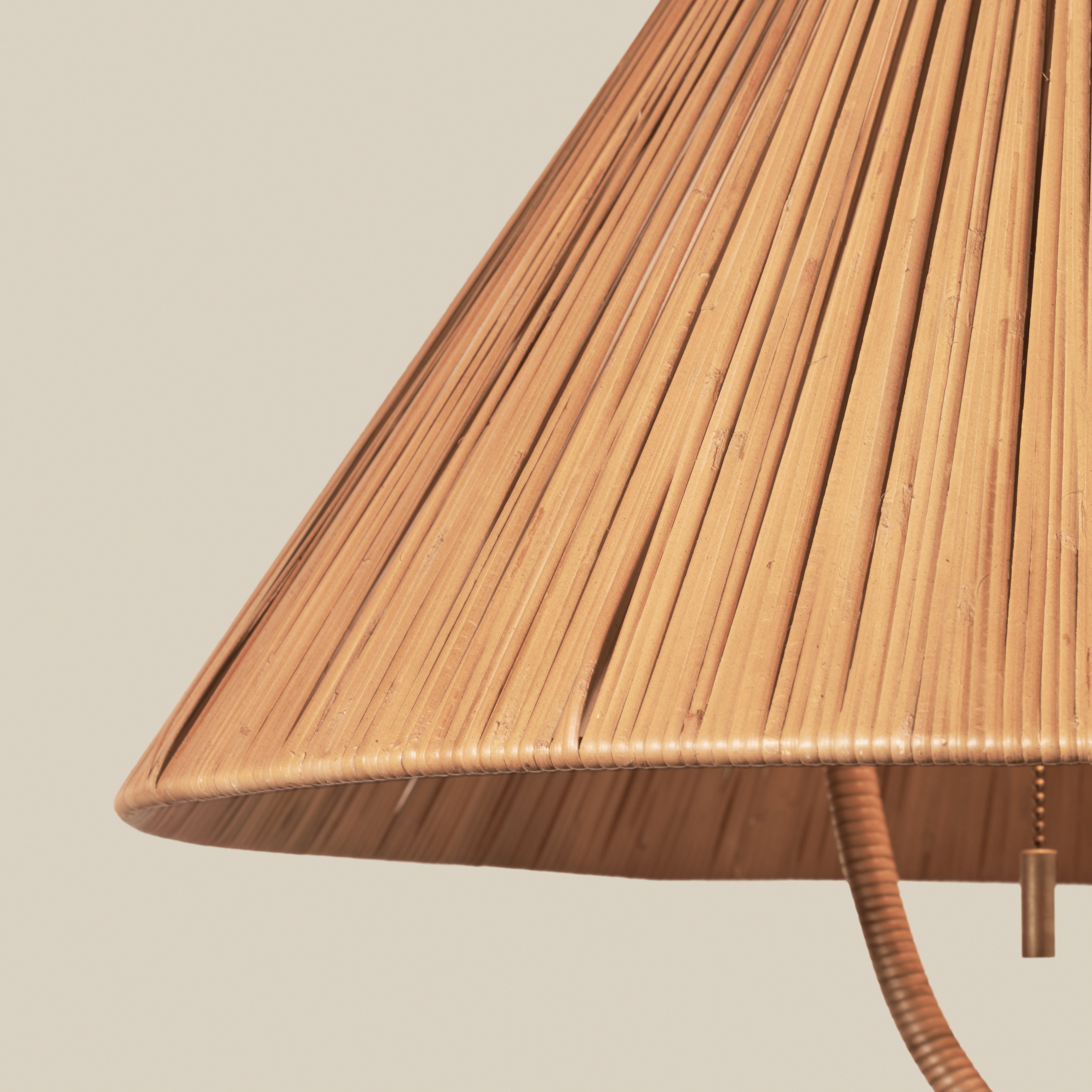 Close up of Delphine Floor Lamp on a beige background at Addison West