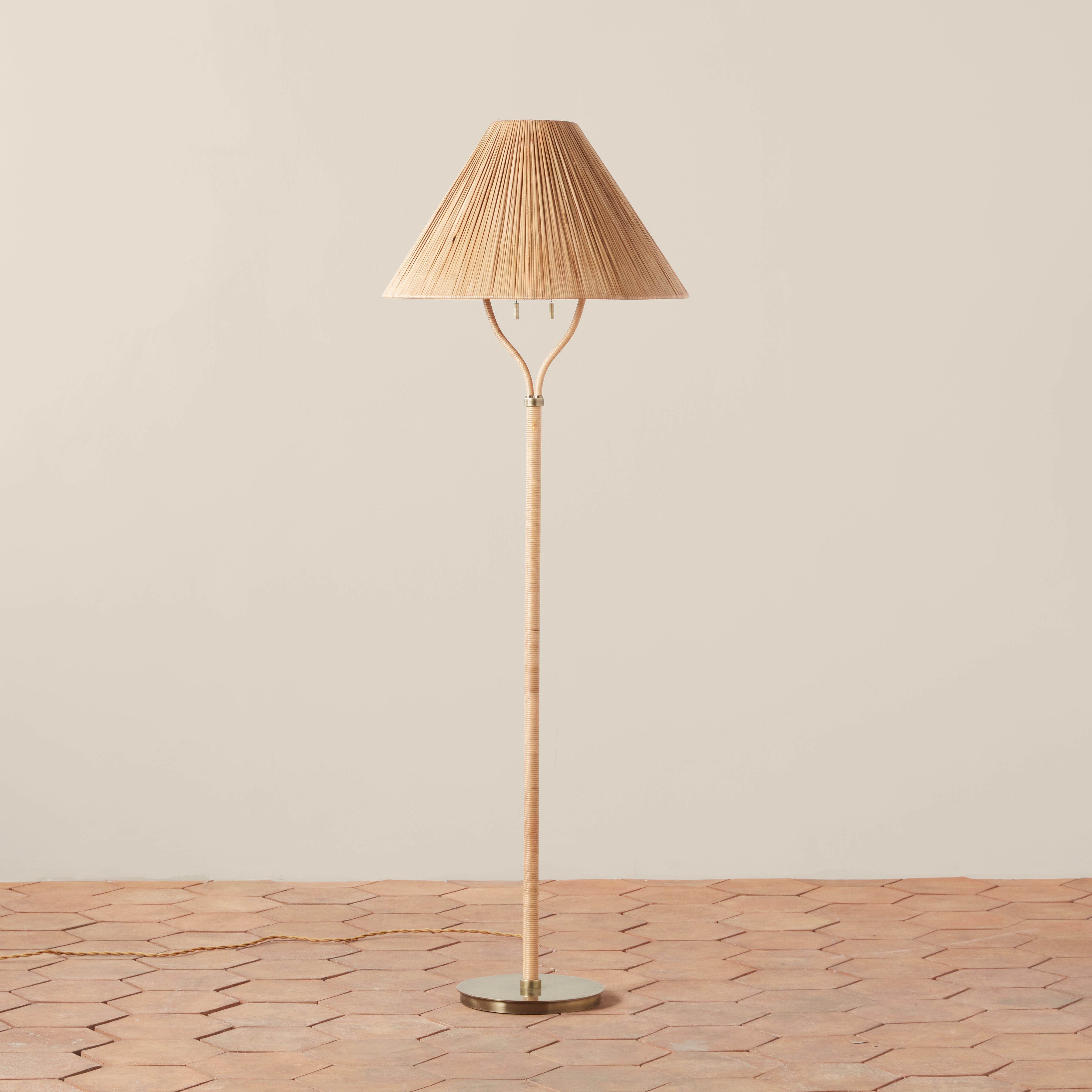 Delphine Floor Lamp on a beige background at Addison West