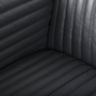 Close up of Ricciardo ribbed Black Leather Wrapped Three Seater Sofa