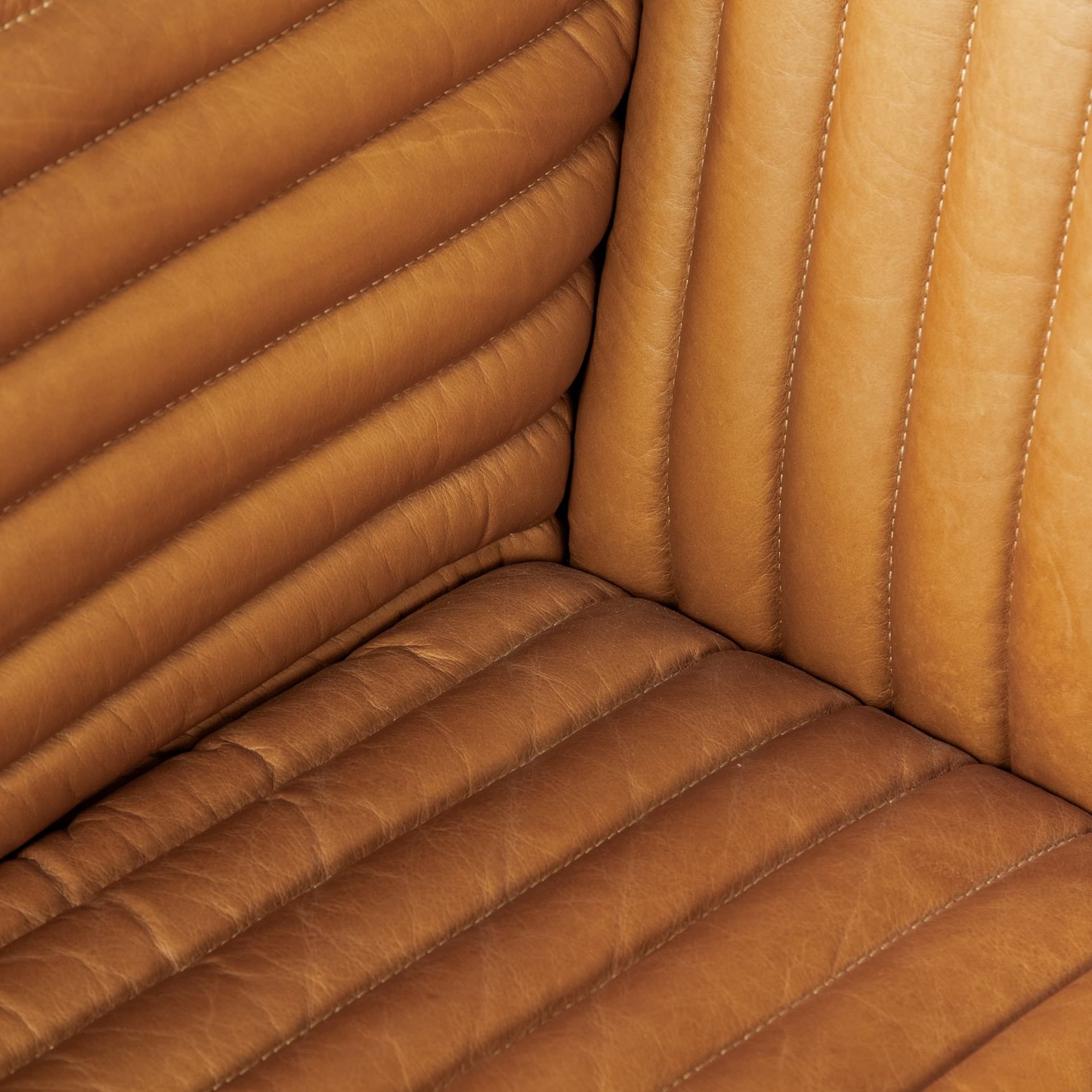 Close up of Ricciardo Cognac Leather Three Seater Sofa