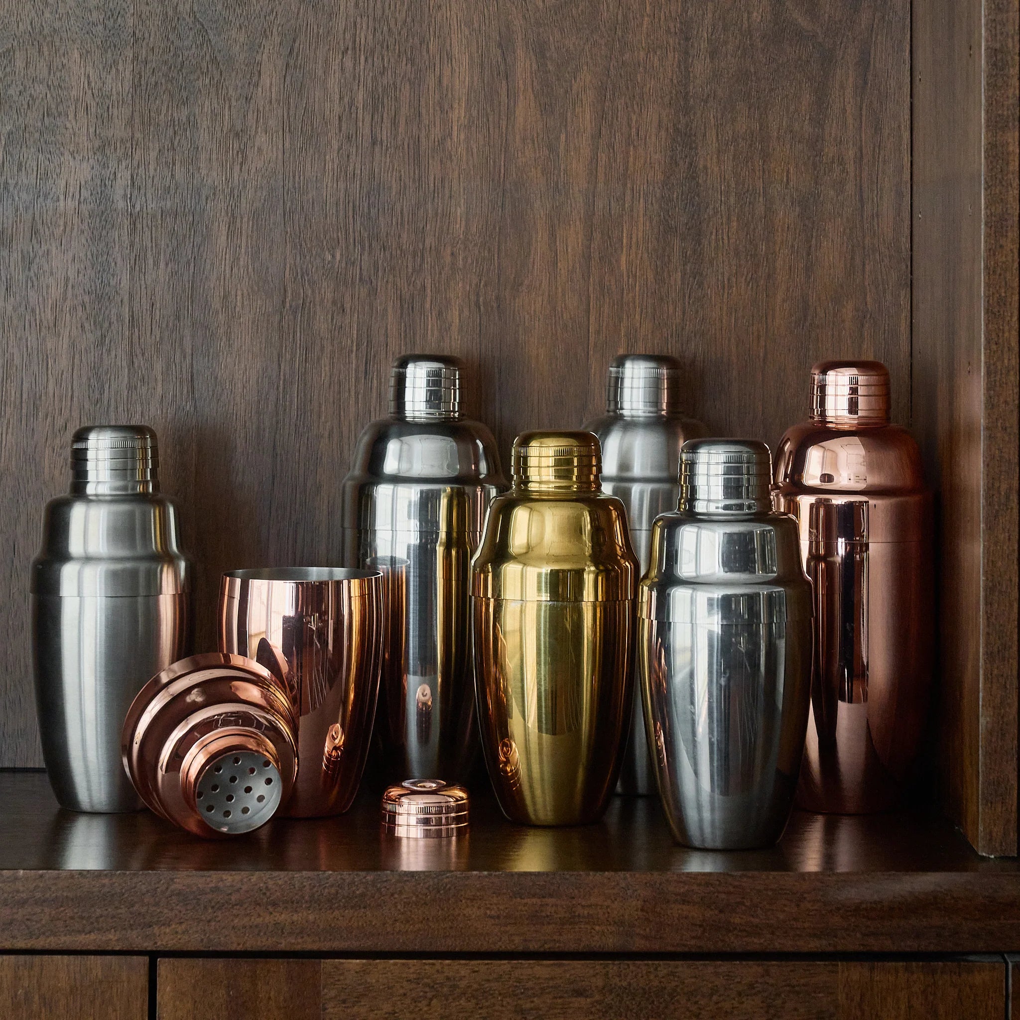 Cocktail Kingdom Stainless Usagi Cobbler Shakers on a wood background at Addison West