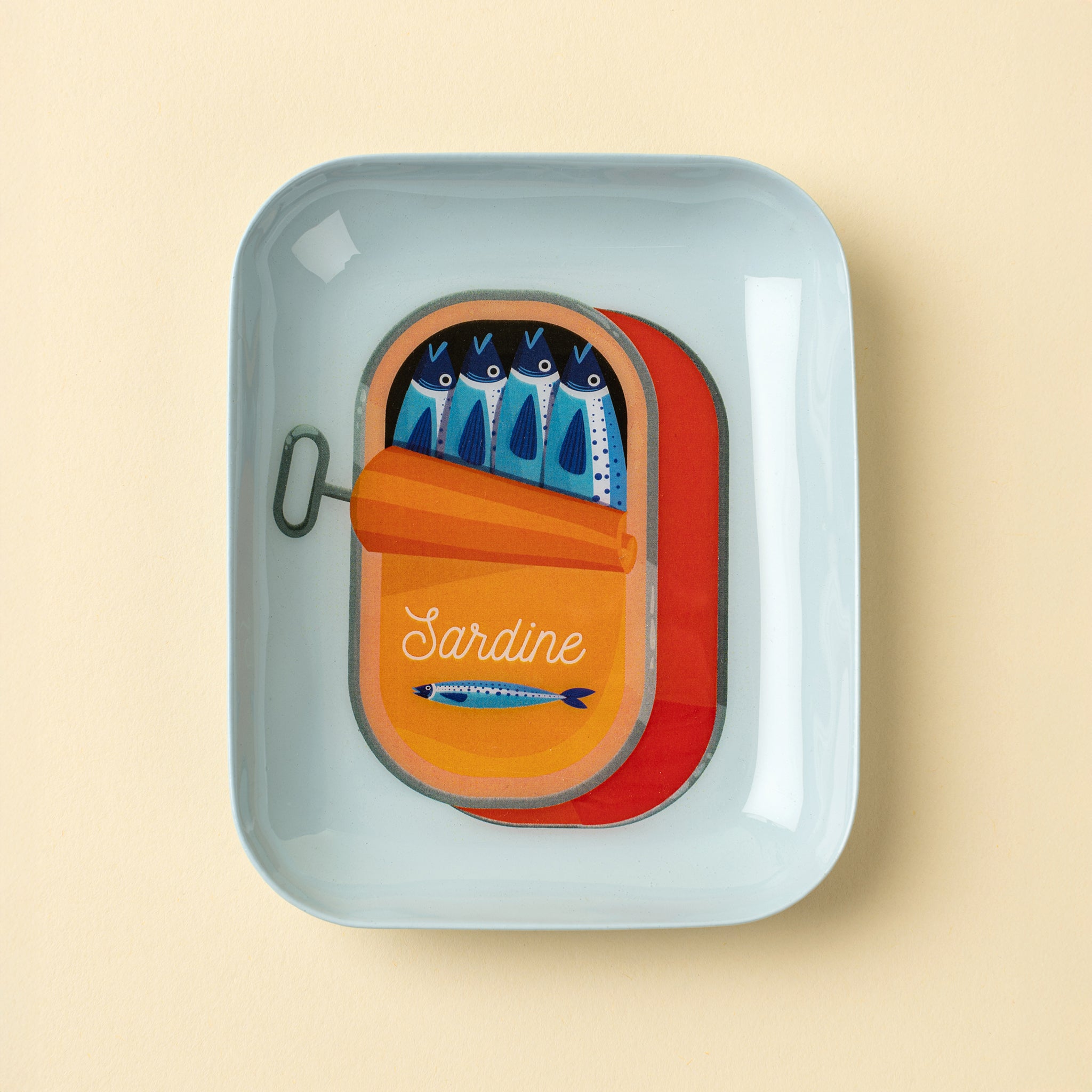 Sardine Enameled Tray on a beige background at Addison West