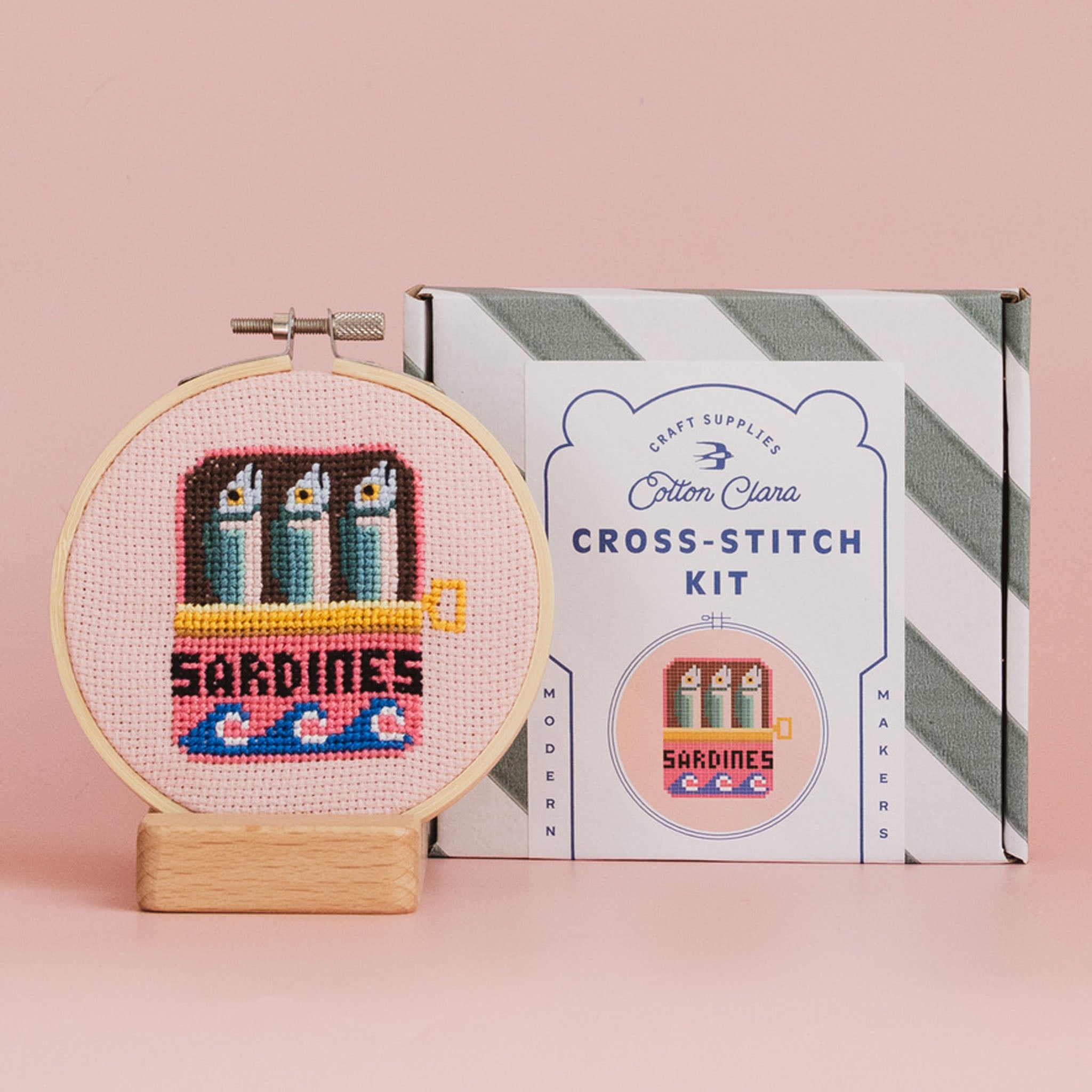 Sardines Cross Stitch Kit on a pink background at Addison West