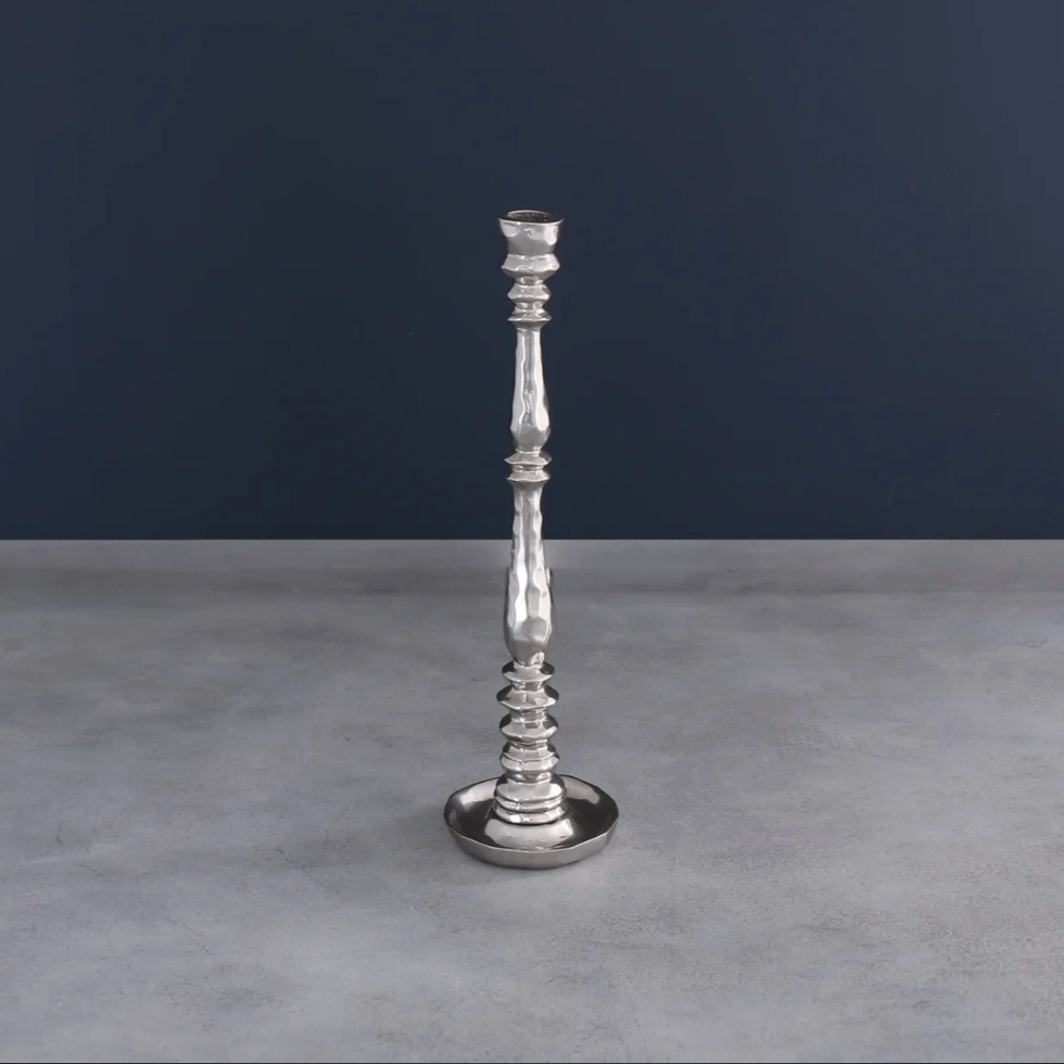 Beatriz Ball Small Encanto Candlestick Holder on a table at Addison West