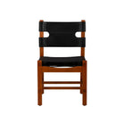 Brown wood and black leather dining chair on a white background