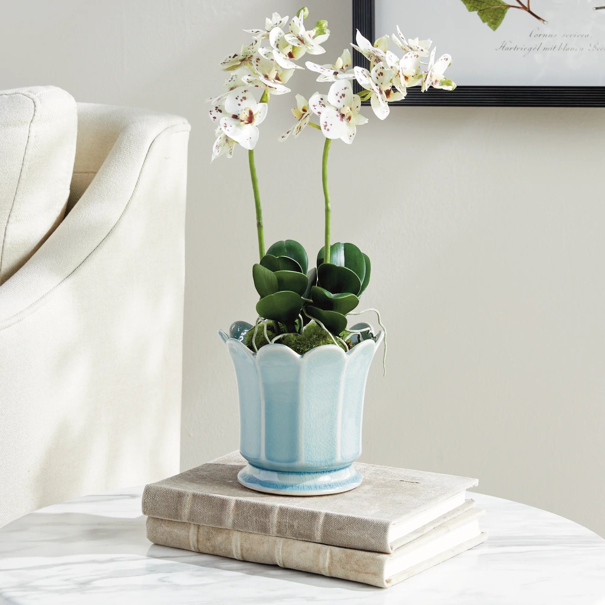 Small Maline Footed Pot in Blue on a table at Addison West
