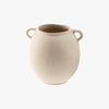 Small round white paper mache vase with handles on a white background