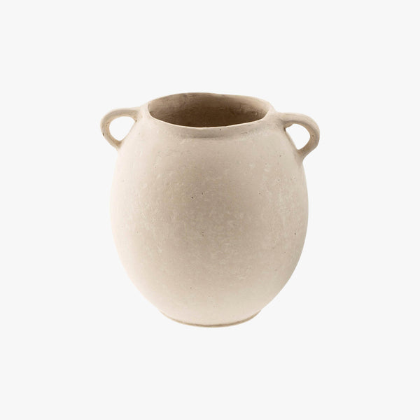 Small round white paper mache vase with handles on a white background
