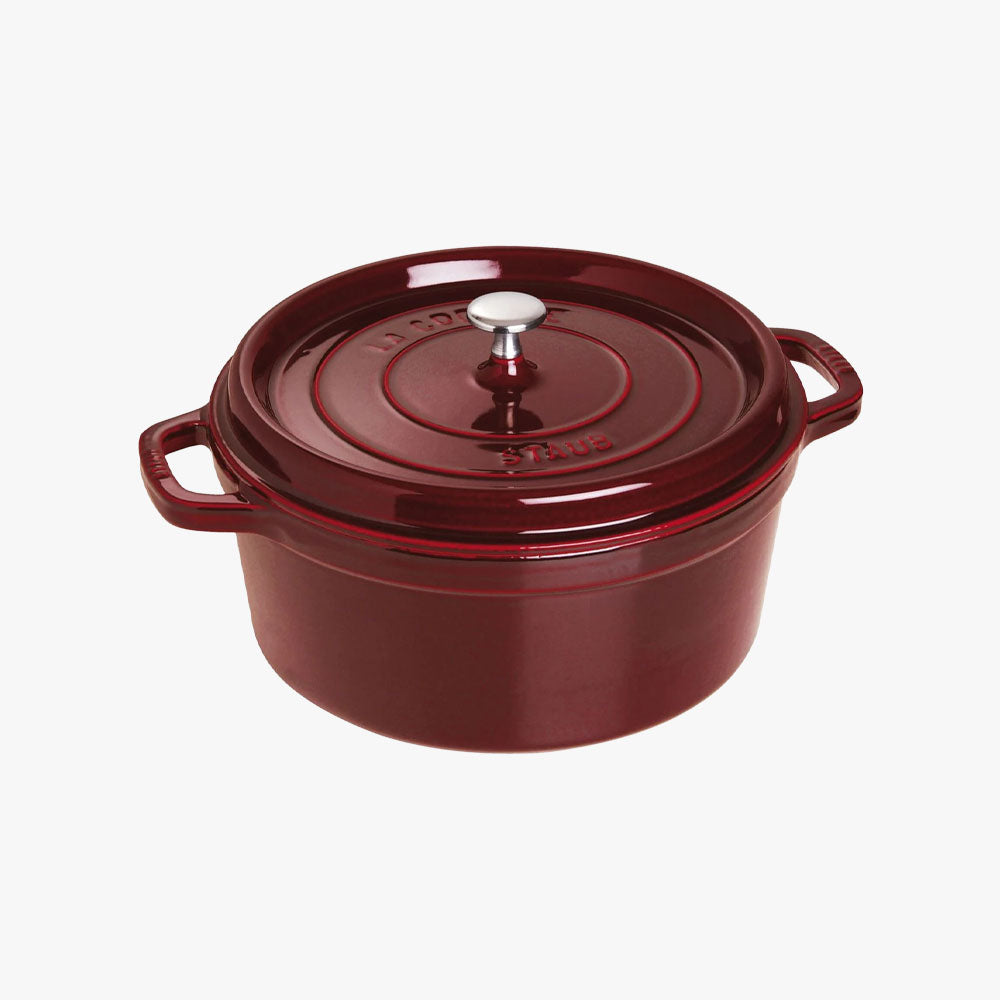 Staub 7 Quart Round Cocotte in Grenadine on a white background