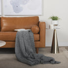 Svend Tan Leather Sofa in a light and airy living room