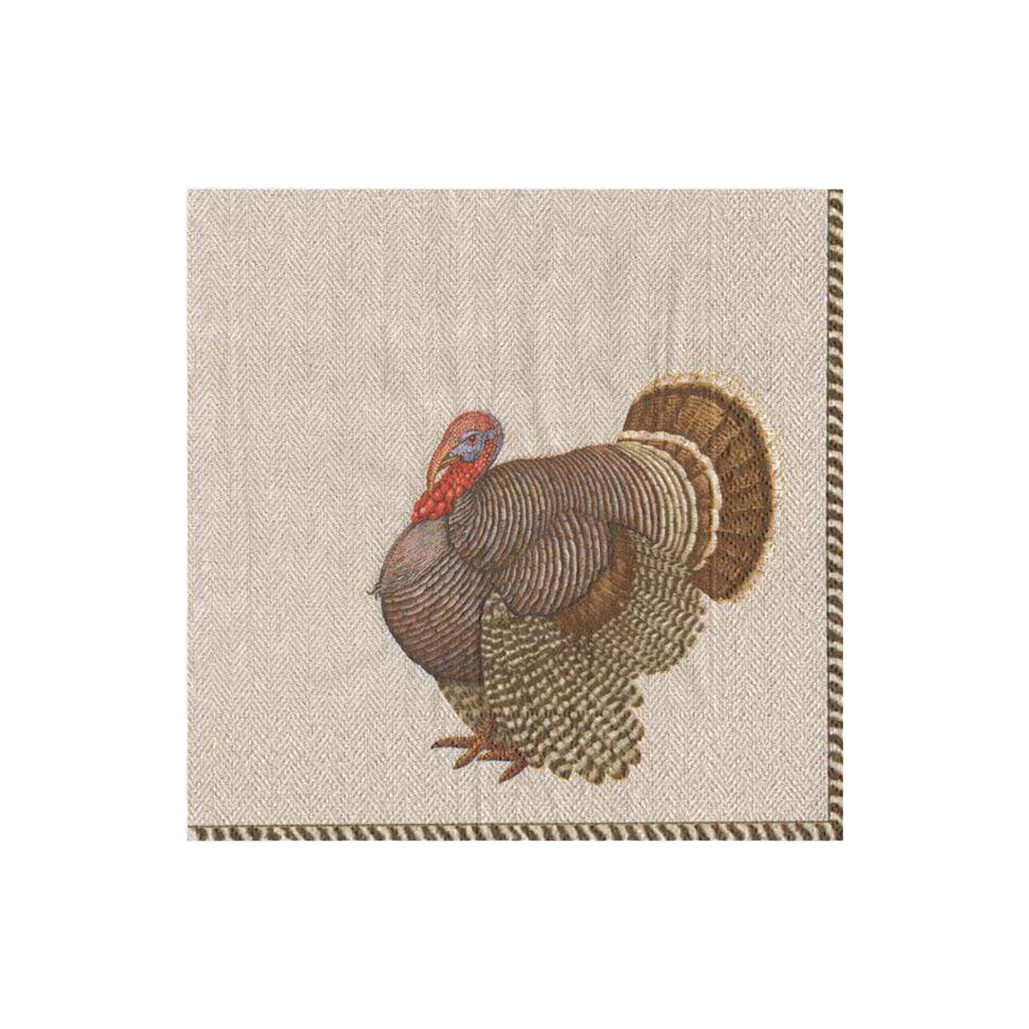 A beige cocktail napkin with a embroidered design of a turkey in the center.