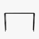 Black iron console table with narrow depth on a white background