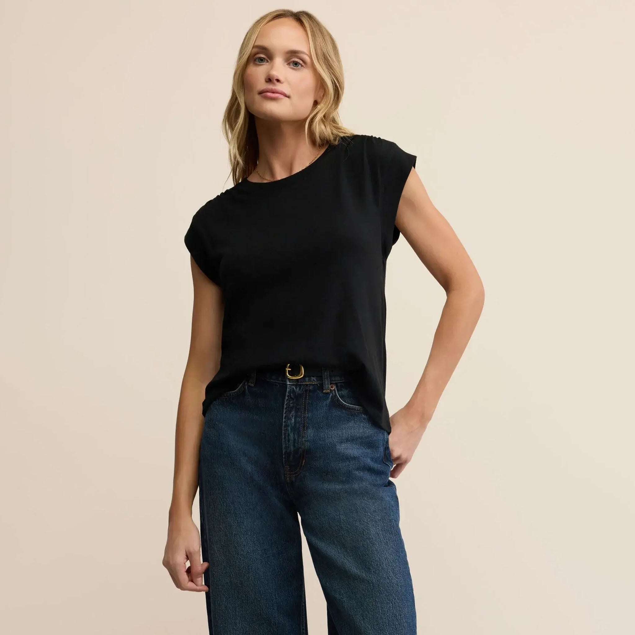 Z Supply Whisper Top in Black on a beige background at Addison West