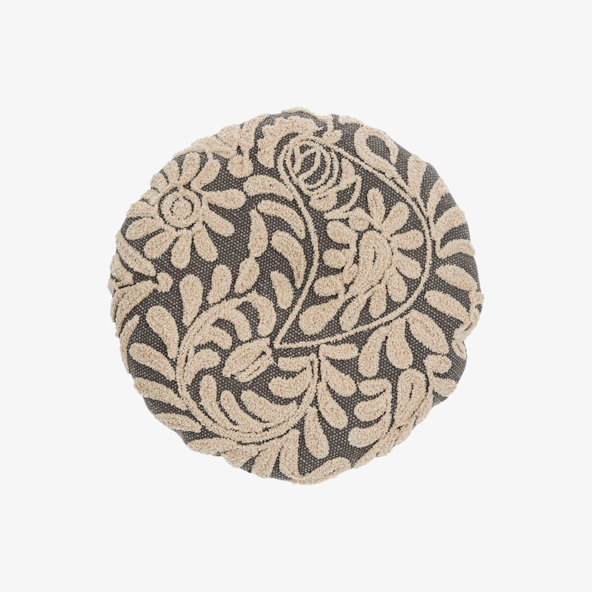 A round grey throw pillow with a hand-embroidered floral pattern.