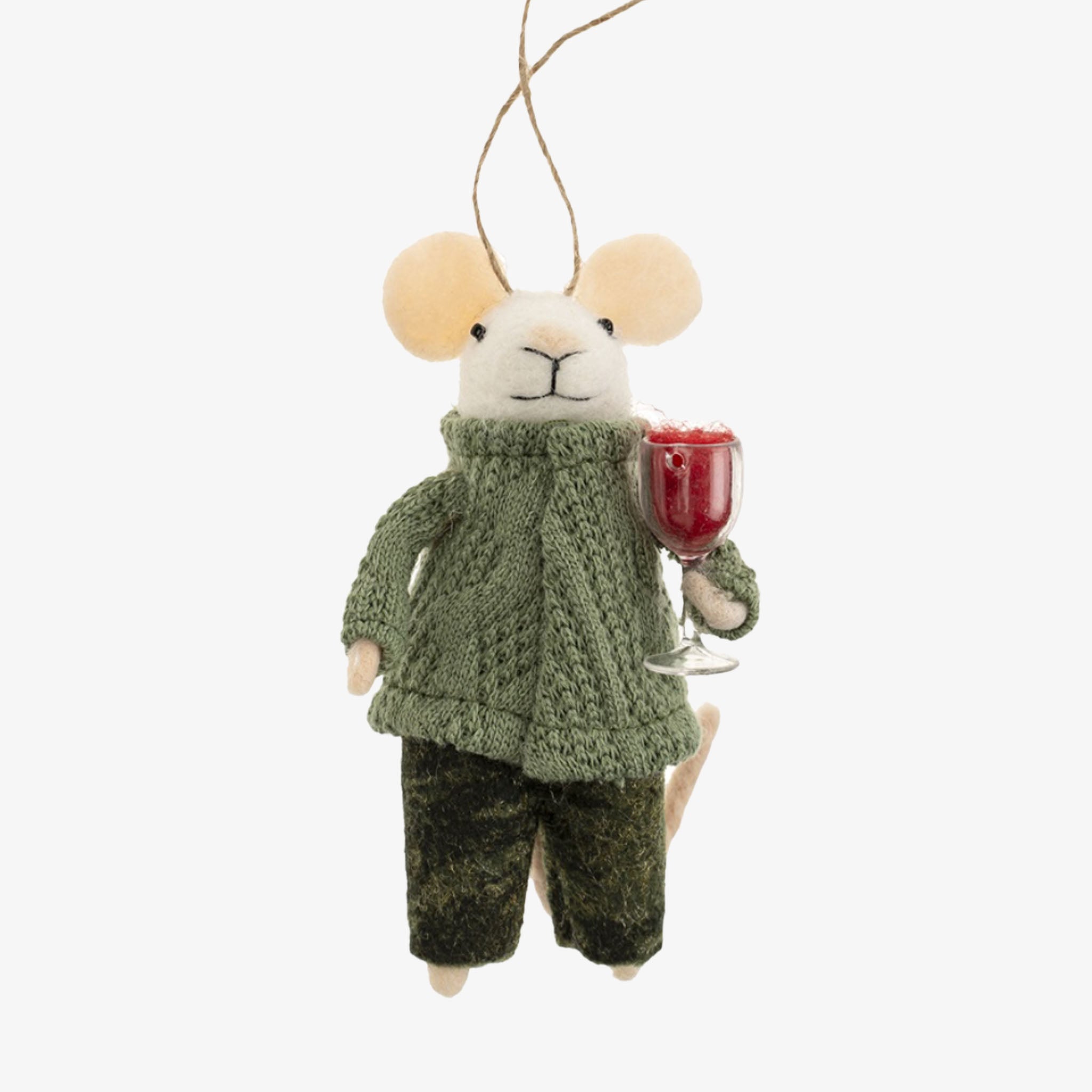 Stuffed mouse toy wearing a green sweater and holding a red glass on a white background