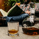 Woodbury Double Old-Fashioned Glass, Set of 2 on a table with a decanter at Addison West