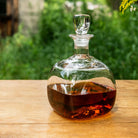 Woodbury Decanter on a wood table at Addison West