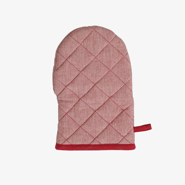 Red quilted oven mitt on a white background
