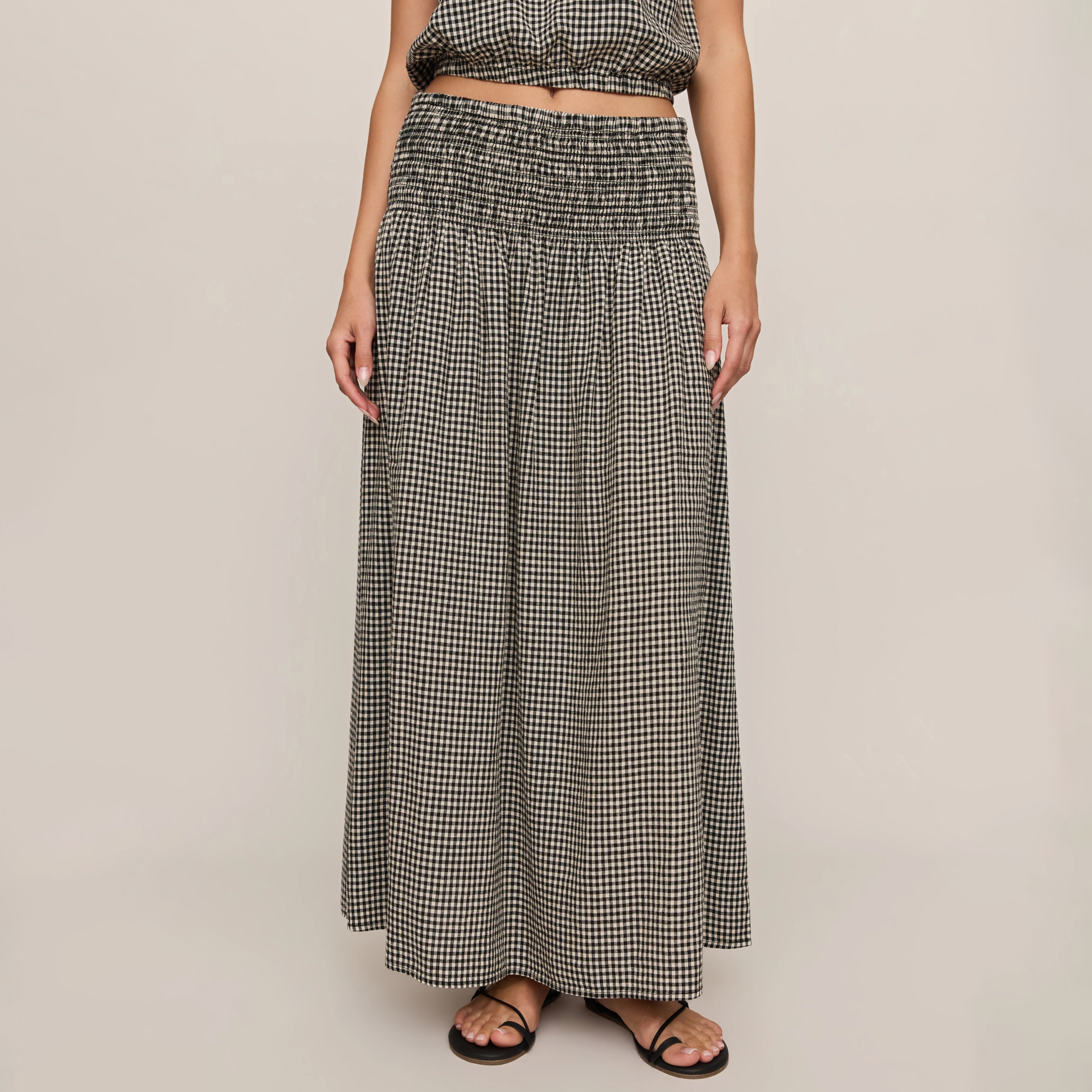 Z Supply Brooke Gingham Skirt in Black shown on model on plain background.