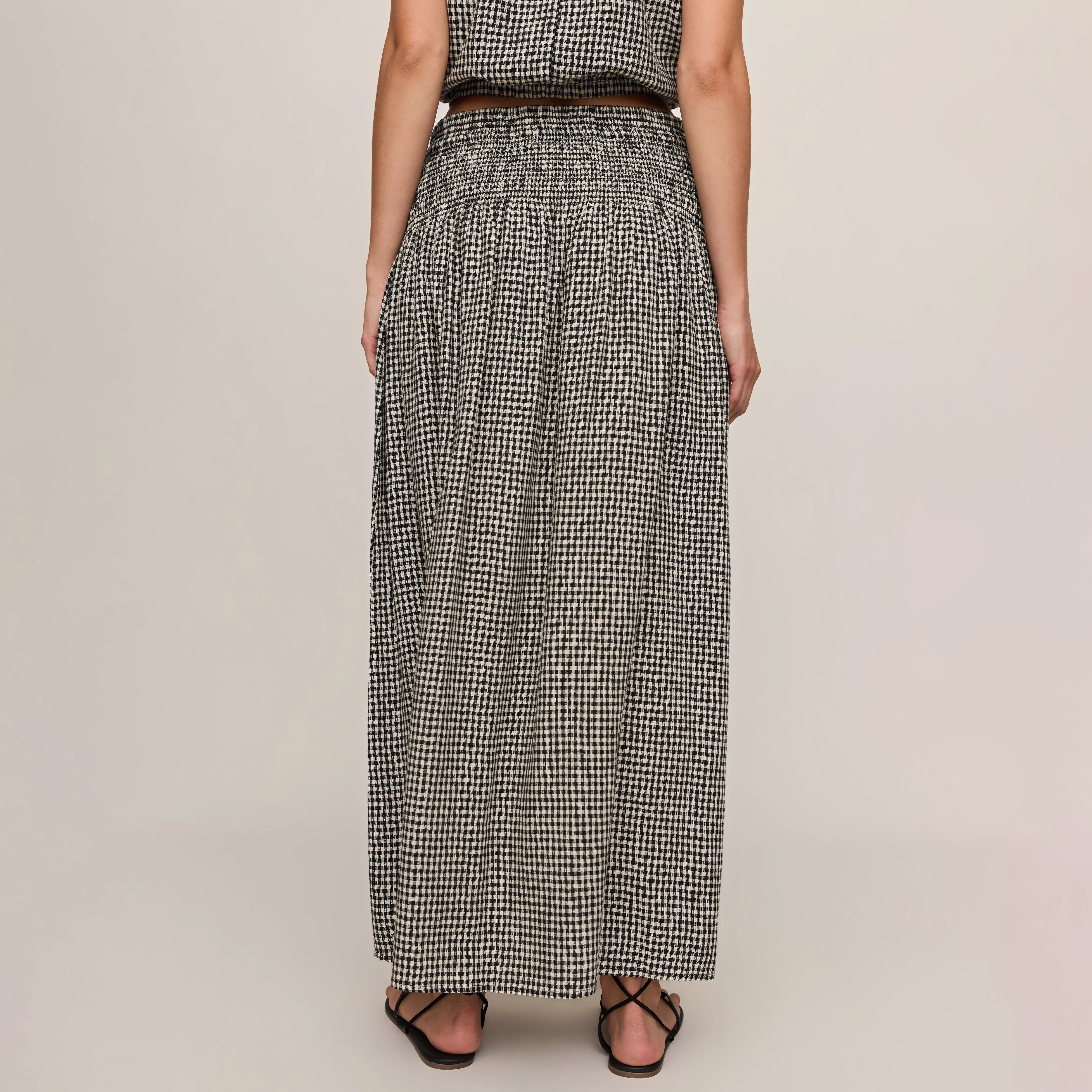 Z Supply Brooke Gingham Skirt in Black shown on model on plain background.