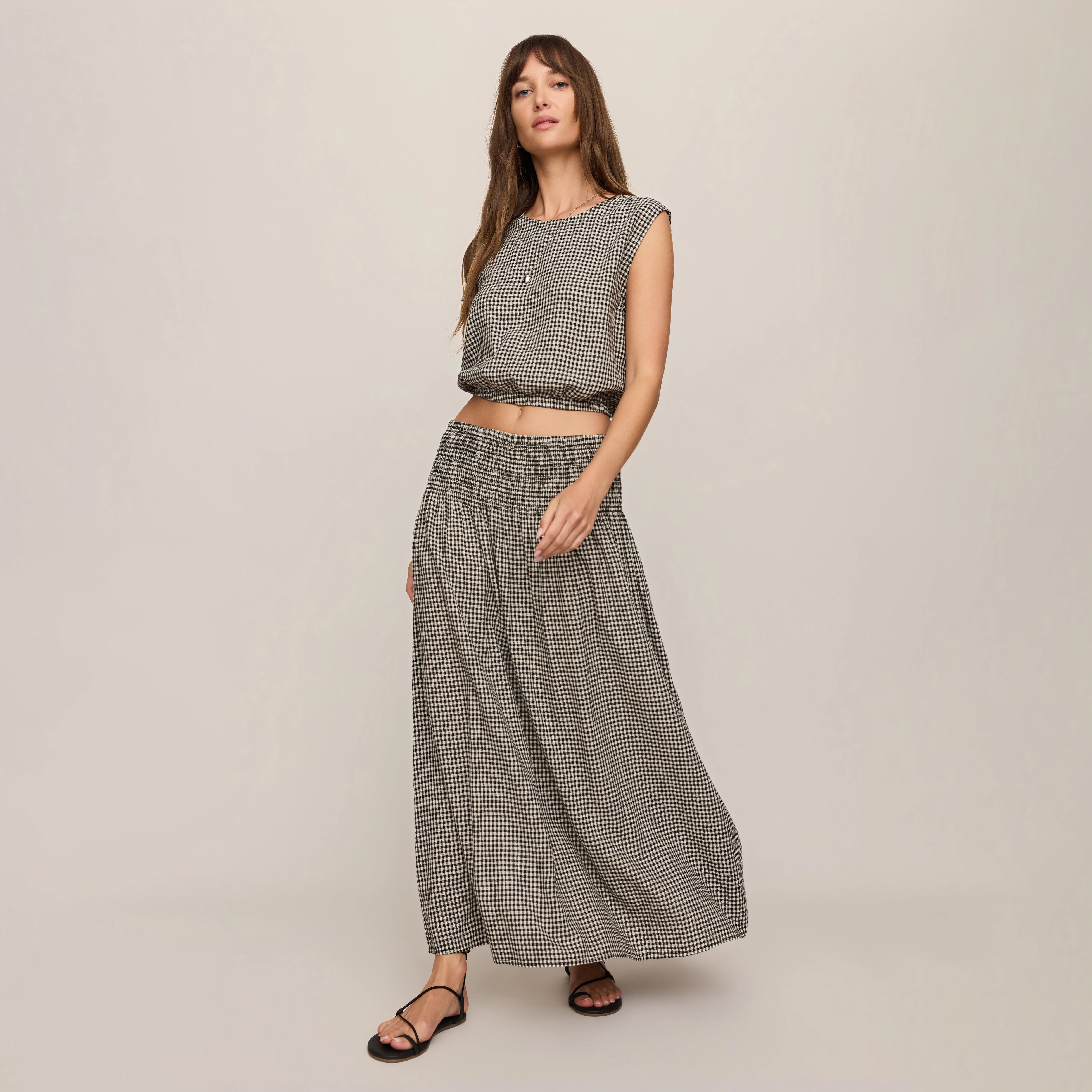 Z Supply Brooke Gingham Skirt in Black shown on model on plain background.