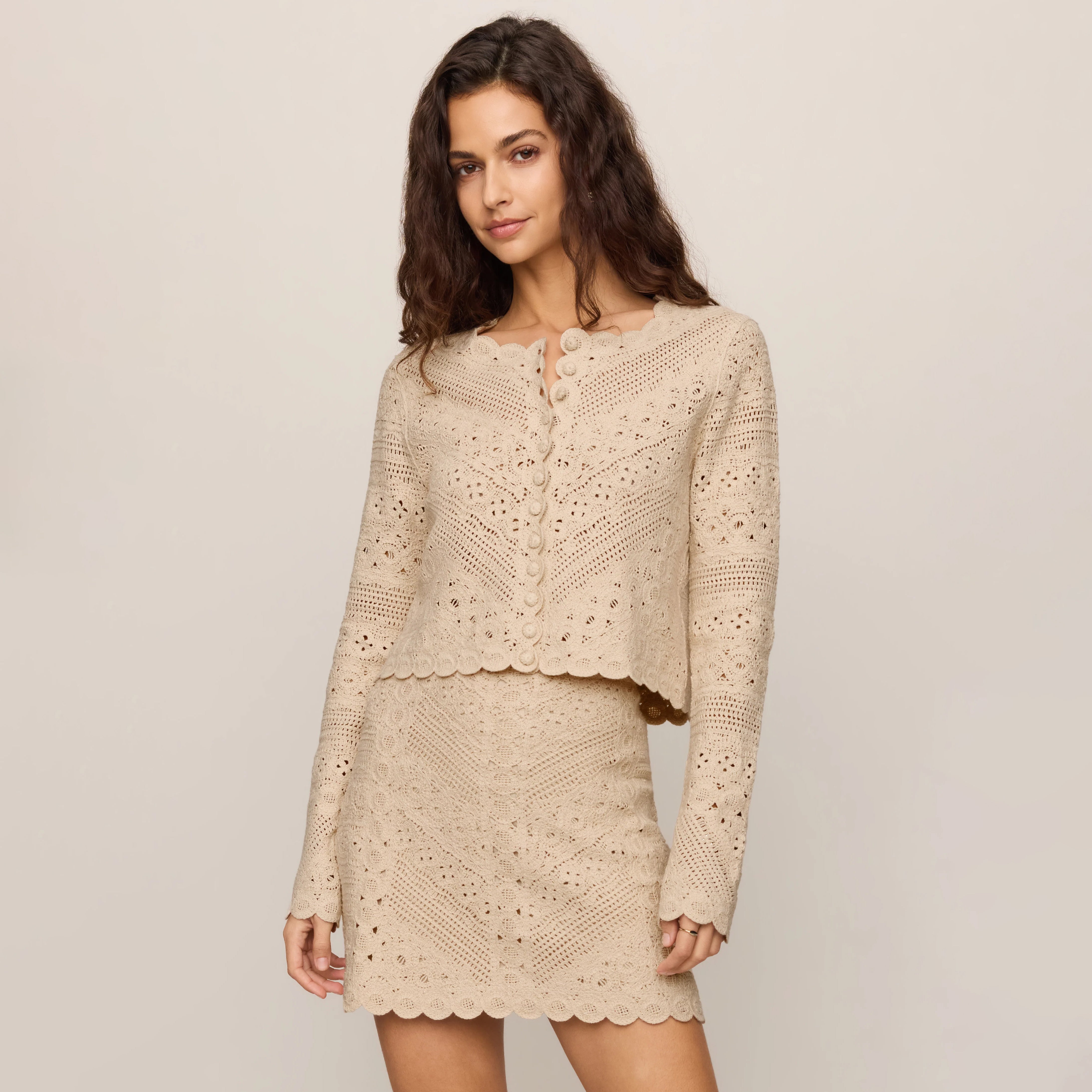 Z Supply Cressa Cardigan in Natural shown on model on plain background.