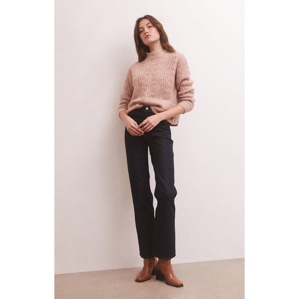 Z Supply Dove Sweater in Shadow Mauve on model with black pants and brown boots in front of a white wall