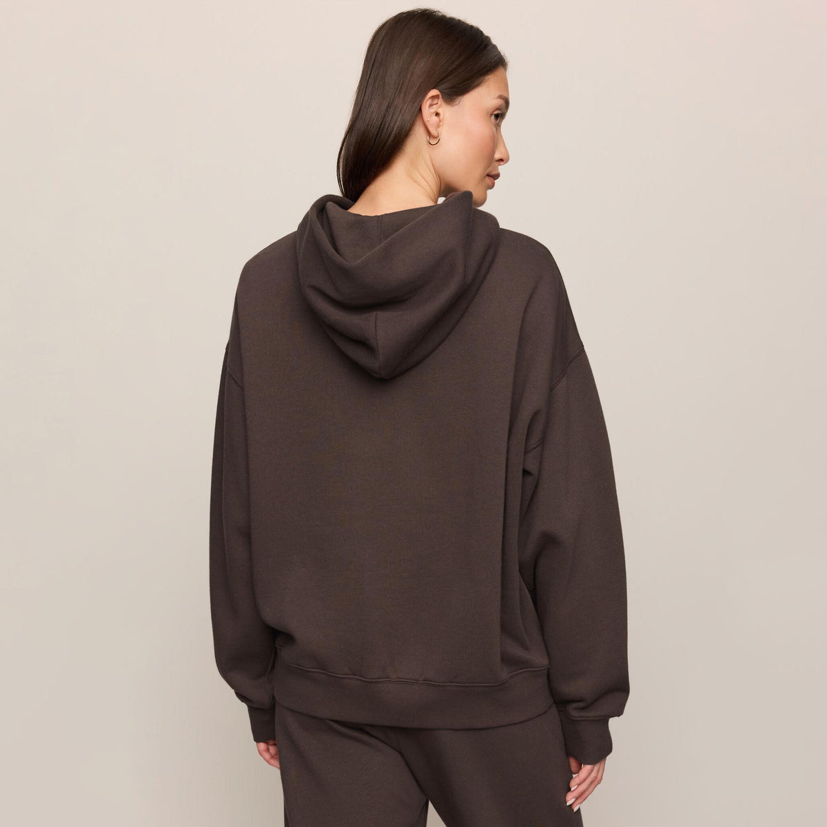 Z Supply First Quarter Hoodie in Cocoa Bean shown on model on plain background.