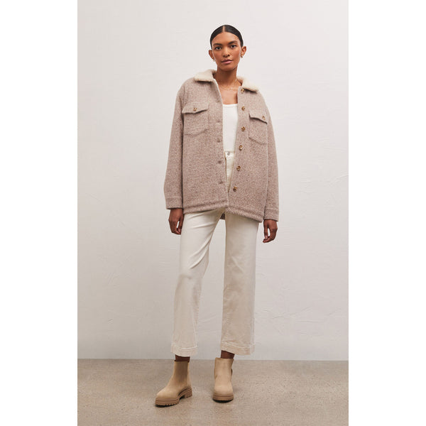 Model wearing Z Supply Jordan Jacket in Heather Latte with beige pants and tan booties in front of a beige wall