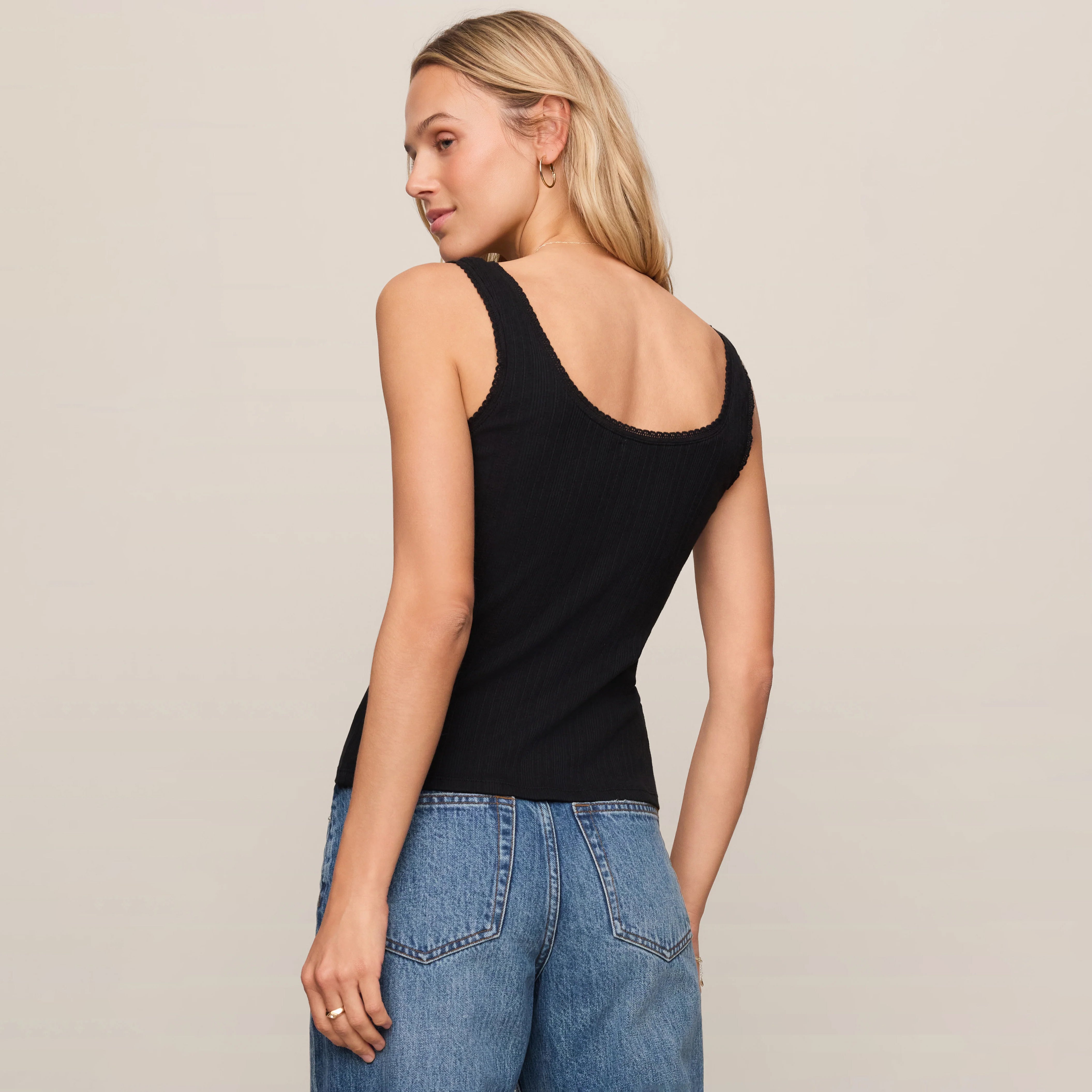 Z Supply Lainey Pointelle Tank in Black shown on model on plain background.