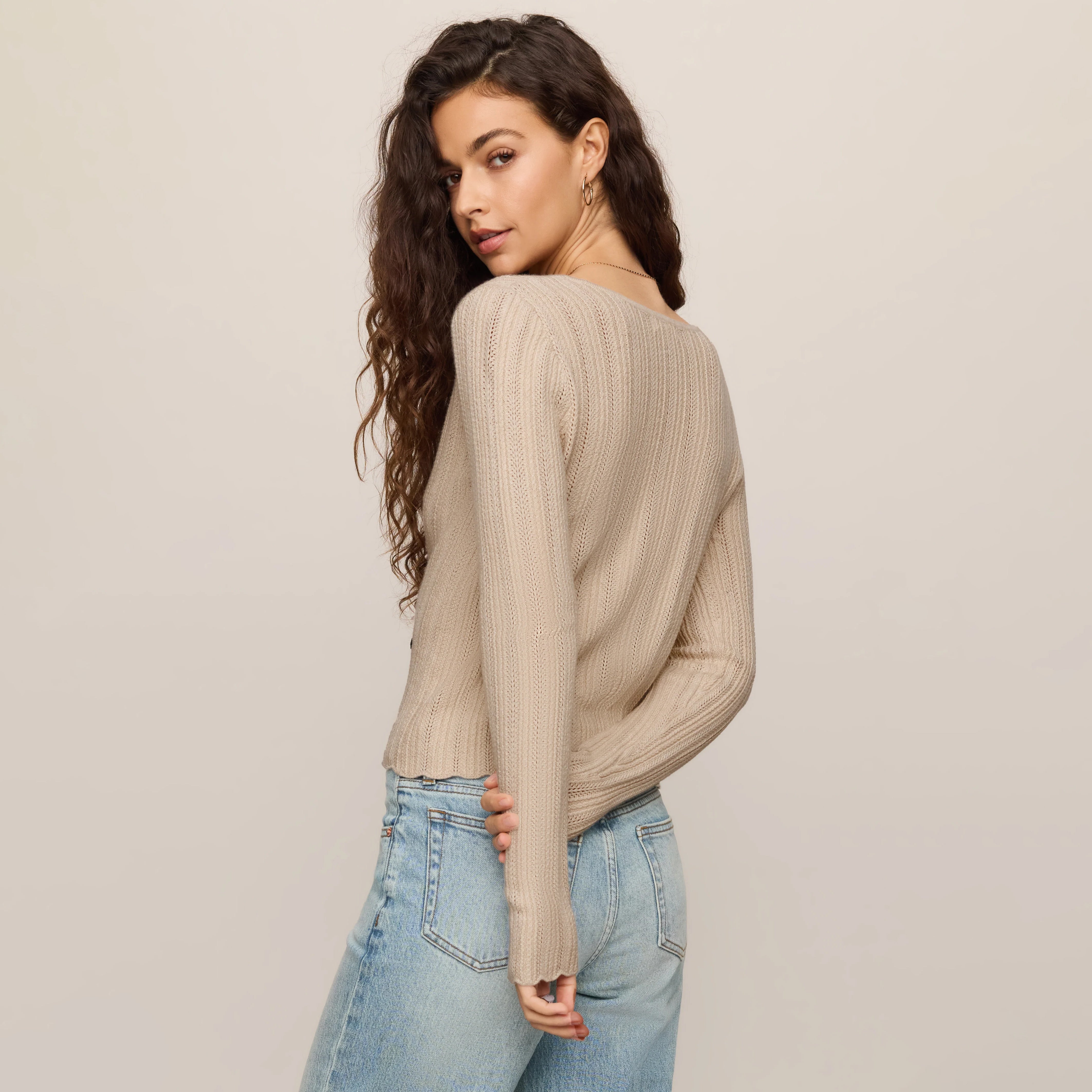 Z Supply Landa Sweater Top in Natural shown on model on plain background.