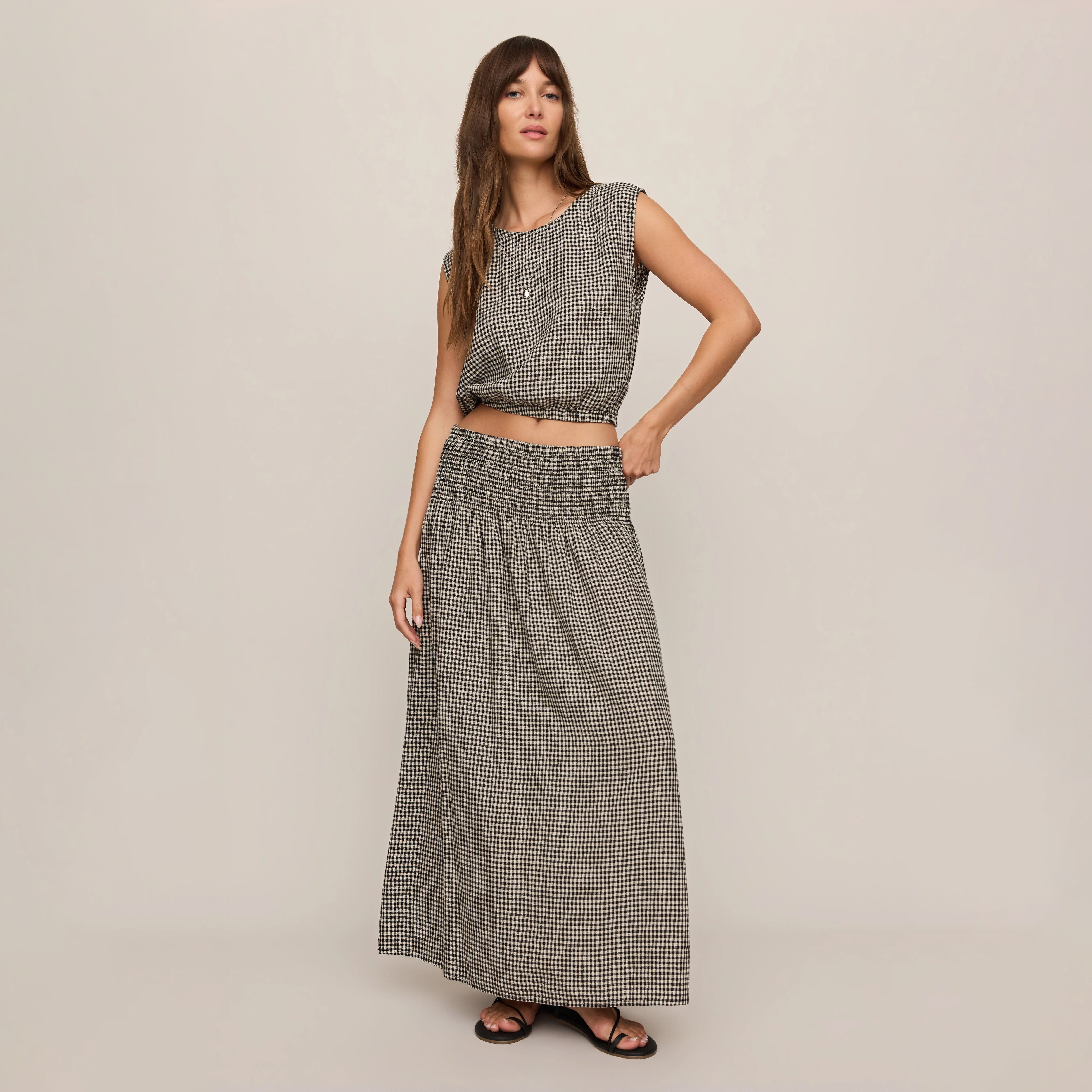 Z Supply Merit Gingham Top in Black shown on model on plain background.