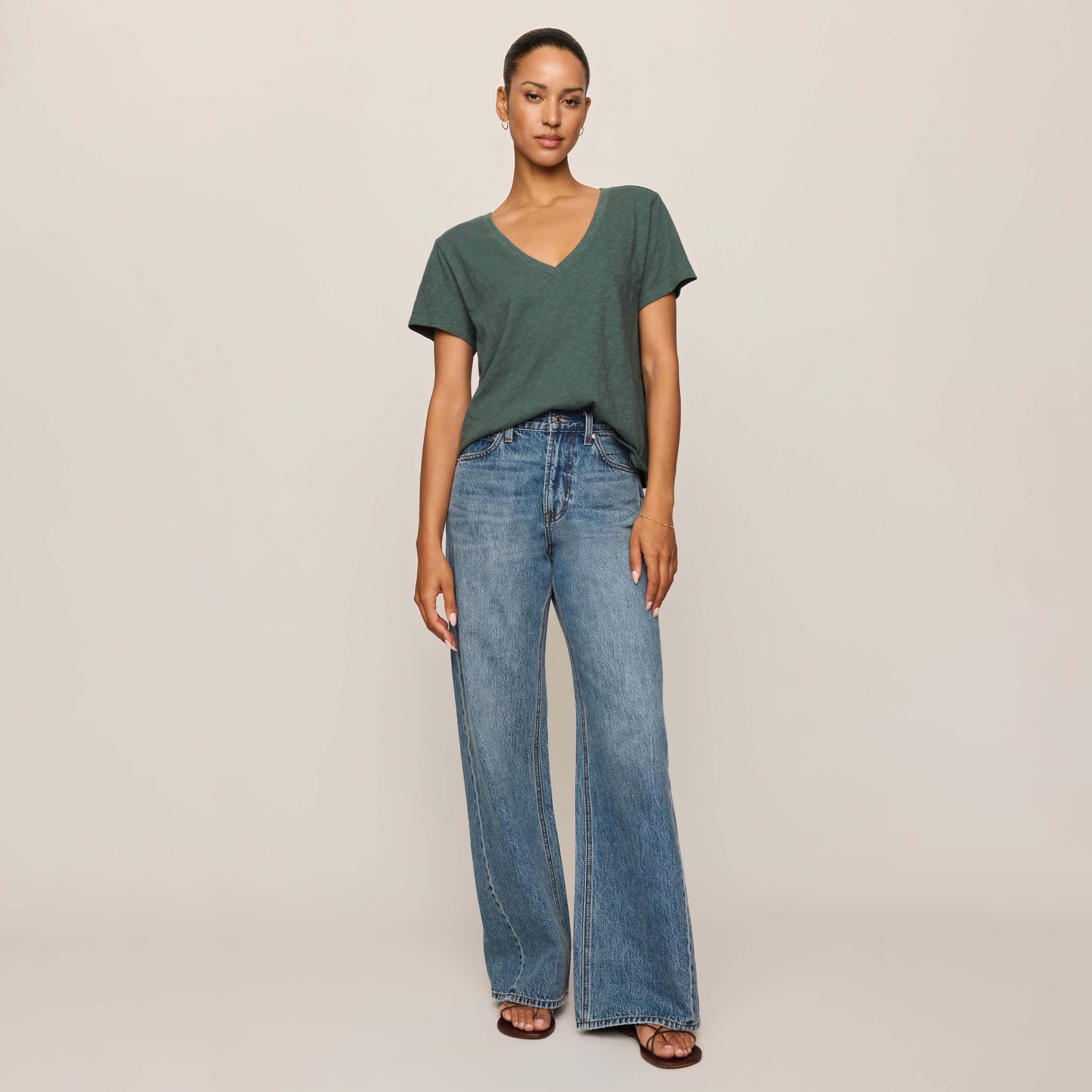 Z Supply Nomad V-Neck Tee in Emerald Cove shown on model on plain background.